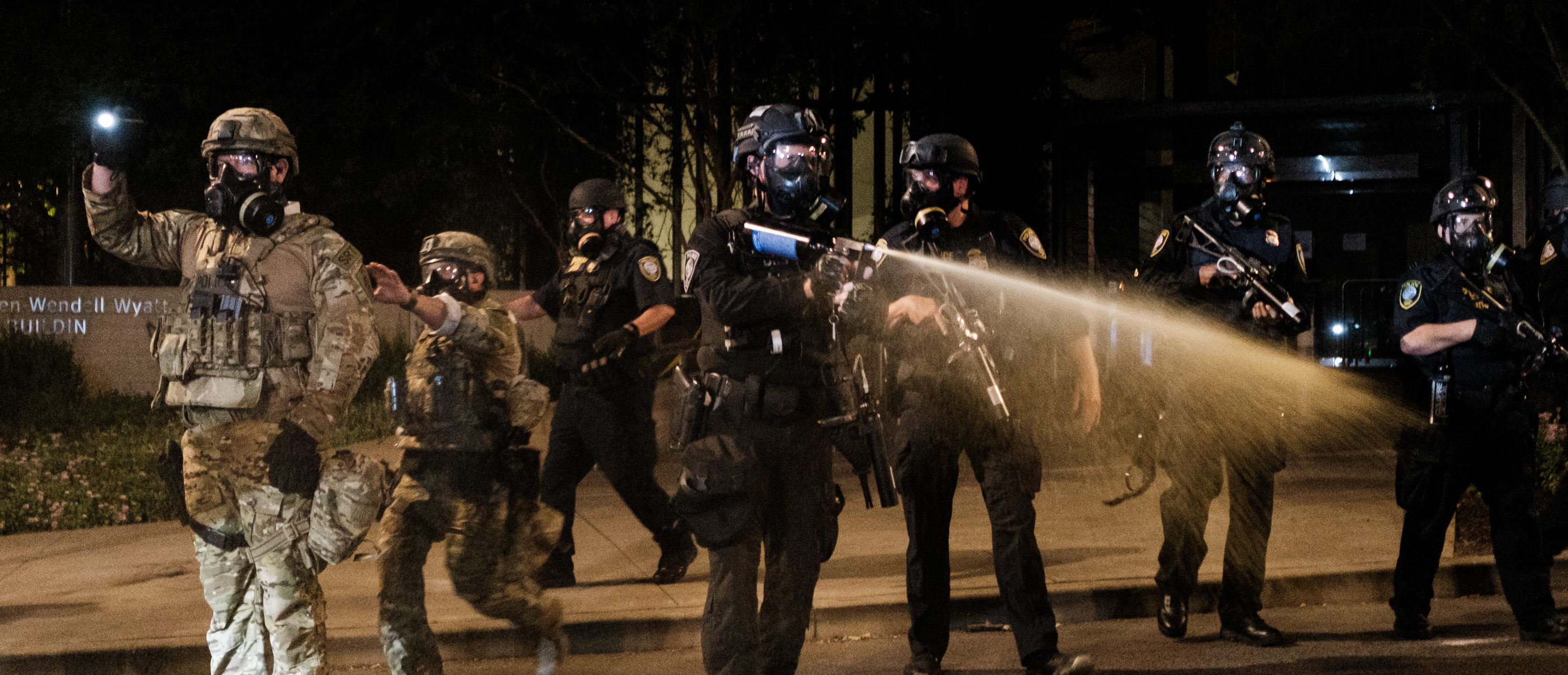 Federal officers use tear gas and other crowd dispersal munitions on protesters outside the Multnomah County Justice Center on July 17, 2020 in Portland, Oregon. (Mason Trinca/Getty Images)