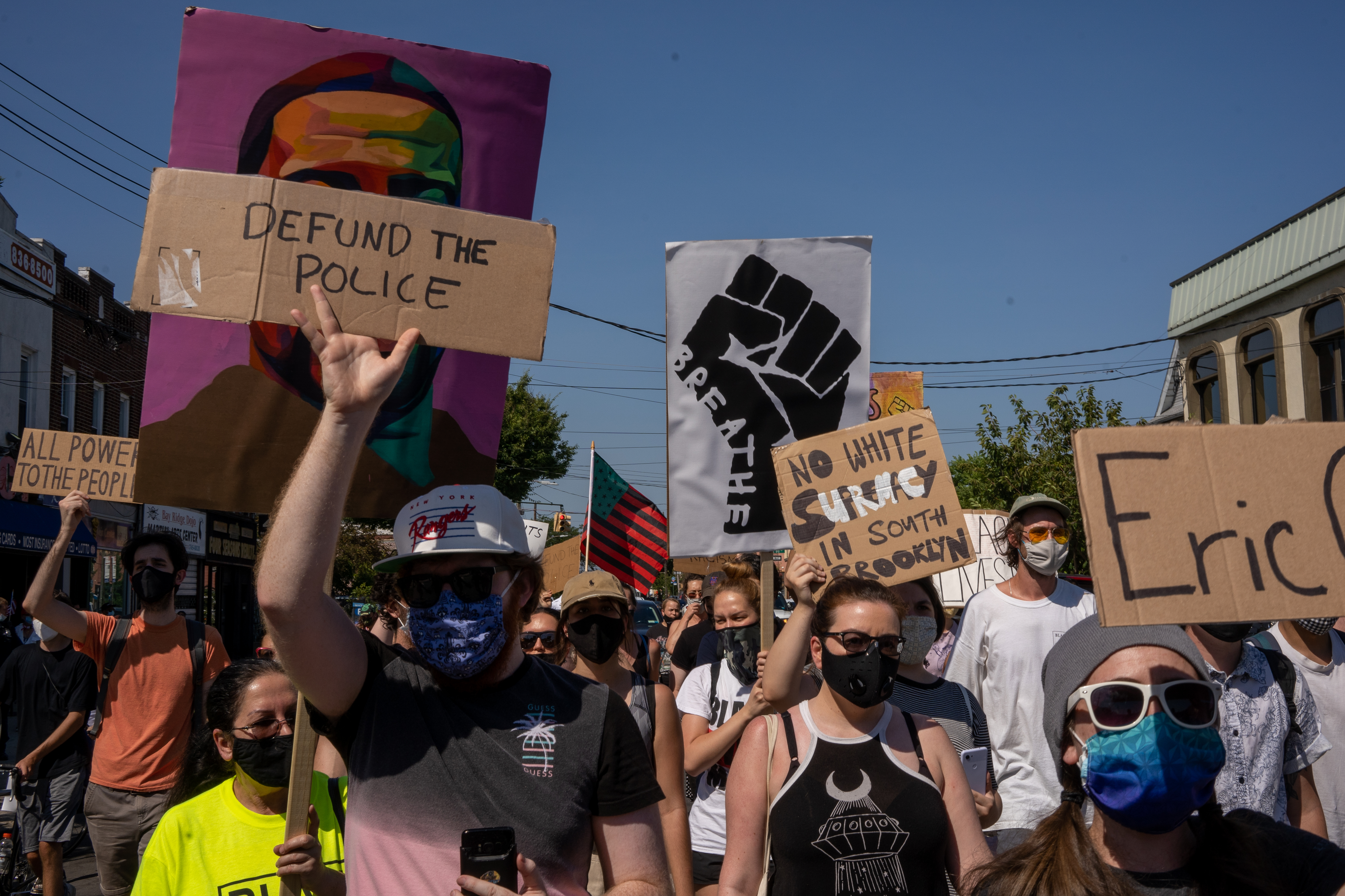 NEW YORK, NY - JULY 18: Protesters gather in Dyker Heights to demand police reform on July 18, 2020 in the Brooklyn borough of New York City. Dyker Heights was the site of a pro-police rally a week ago that led to confrontations and arrests. (Photo by David Dee Delgado/Getty Images)