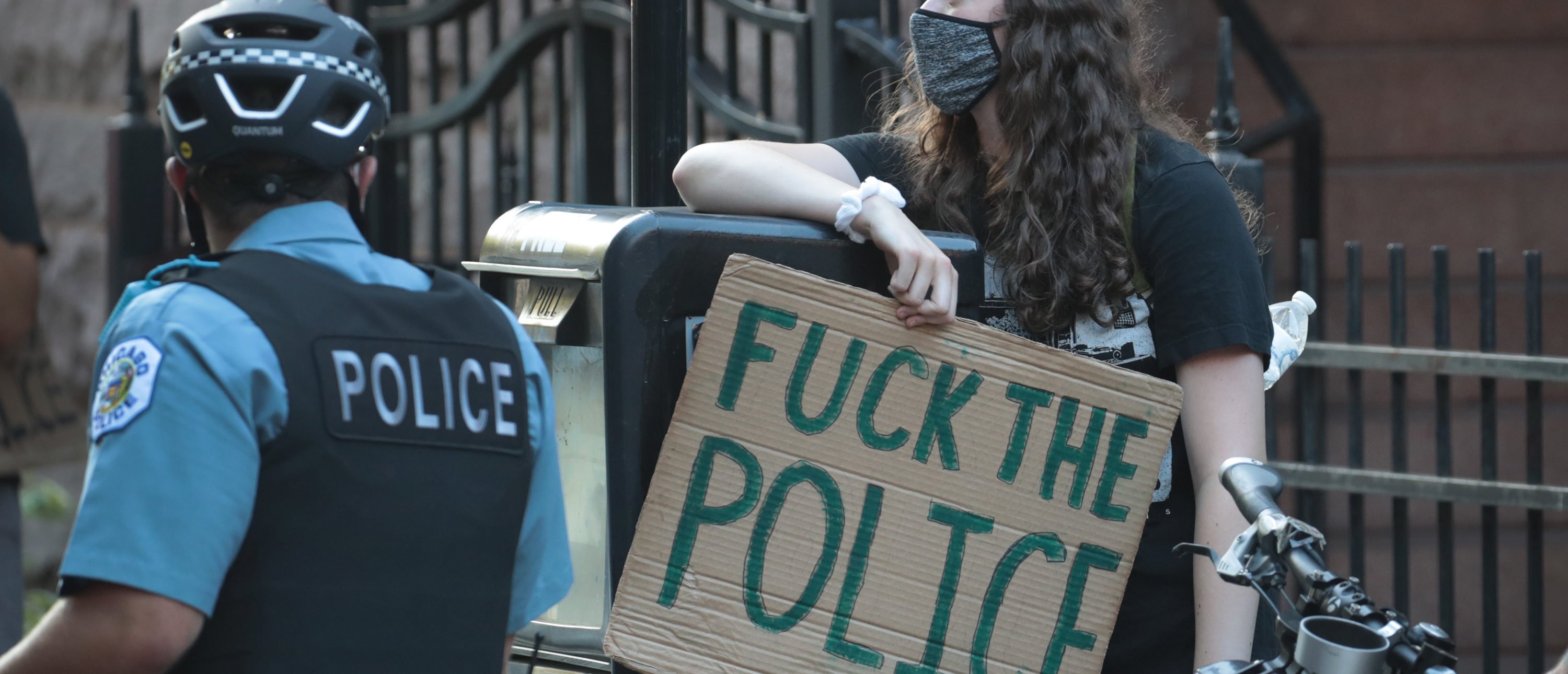 CHICAGO, ILLINOIS - JULY 10: Chicago police prevent demonstrators from reaching the private residence of Illinois Governor J.B. Pritzker on July 10, 2020 in Chicago, Illinois. Demonstrators stage a protest against police torture and demanded for Governor Pritzker to release all police torture survivors and the wrongfully convicted. (Photo by Scott Olson/Getty Images)