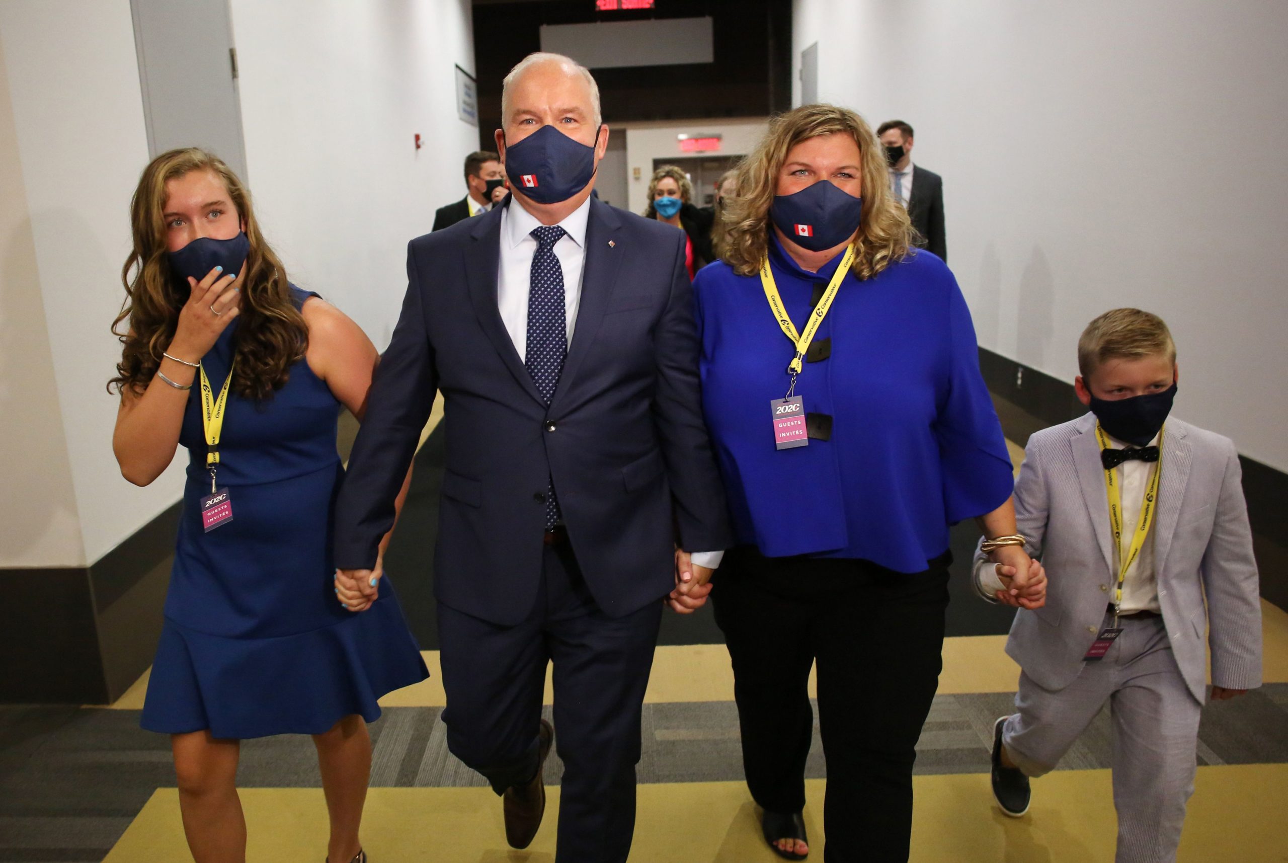 Newly elected Conservative Party of Canada leader Erin O'Toole (2nd L) arrives with his wife Rebecca (2nd R), daughter Mollie (L) and son Jack (R) to delivery his speech during the 2020 Leadership Election in Ottawa August 24, 2020. (Photo by Dave Chan / AFP) (Photo by DAVE CHAN/AFP via Getty Images)