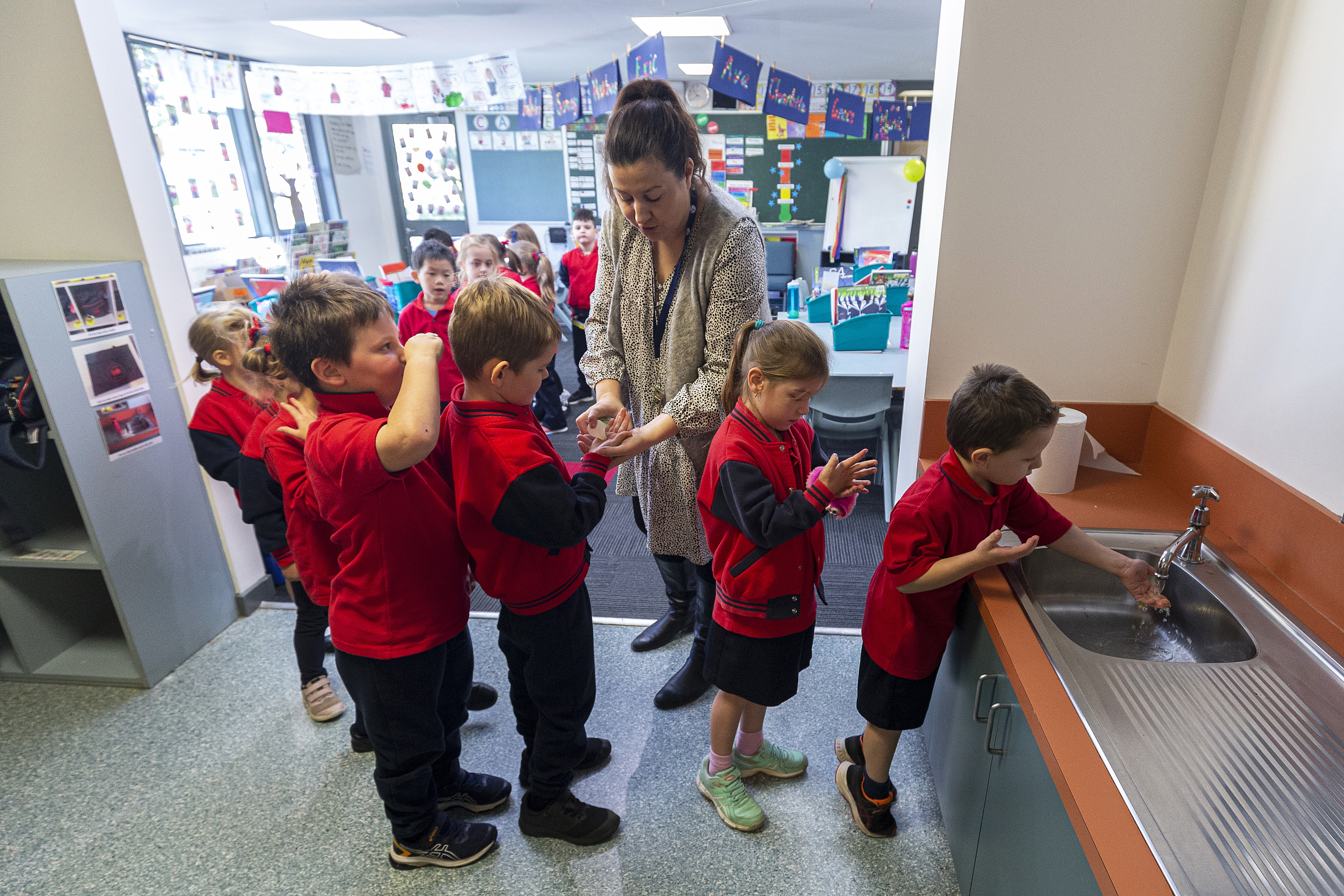 Students sanitize at Lysterfield Primary School on May 26, 2020 in Melbourne, Australia. (Daniel Pockett/Getty Images)