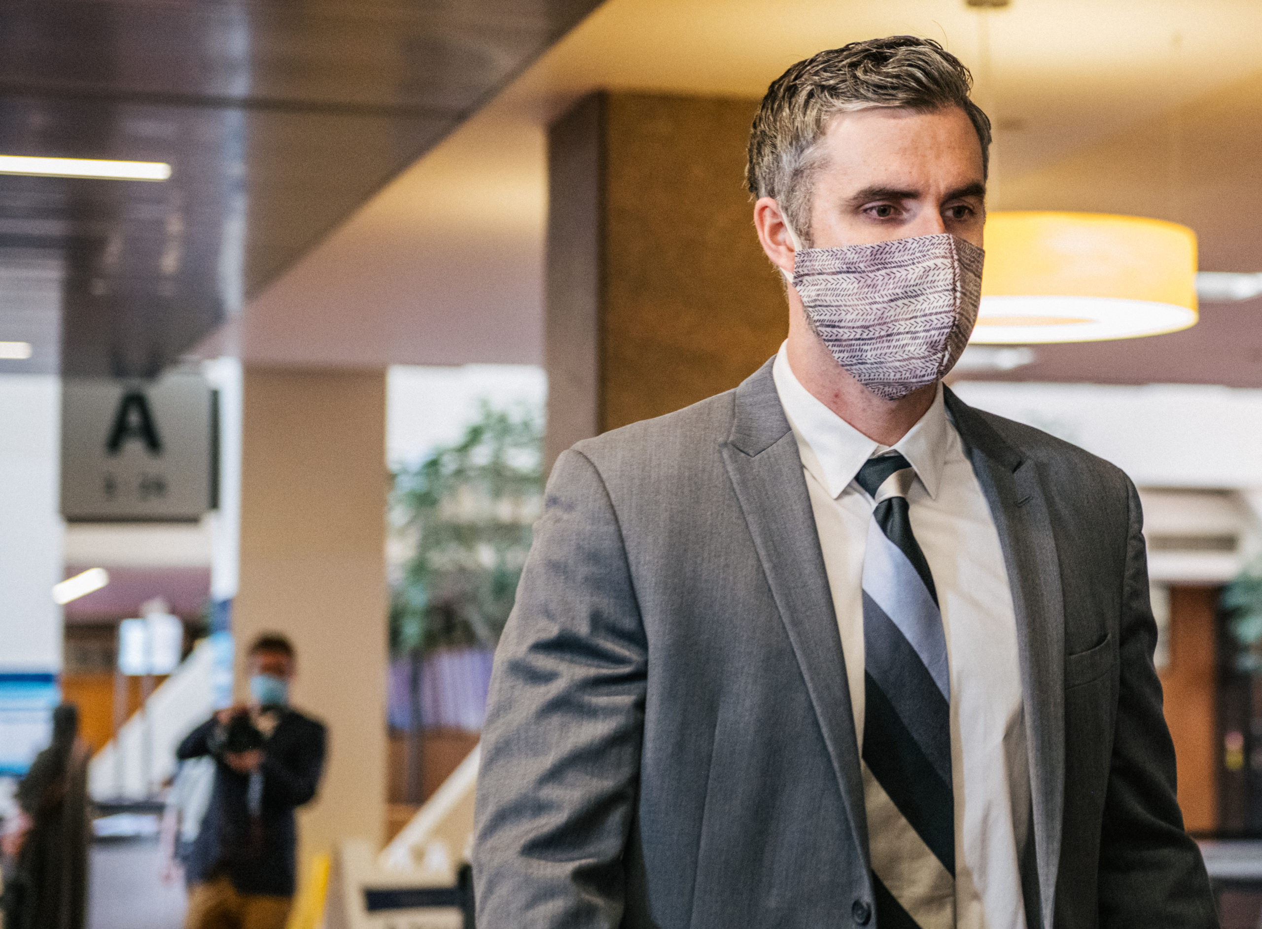 Former Minneapolis police officer Thomas Lane passes through the A-tower public entrance, ahead of a courthouse appearance, at the Hennepin County Government Center on July 21, 2020 in Minneapolis, Minnesota. (Brandon Bell/Getty Images)