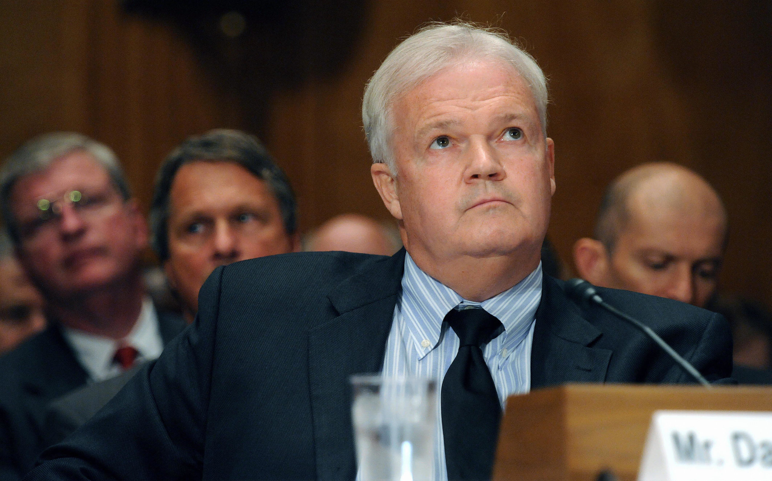 David C. Williams testifies on Capitol Hill in 2009 when he was inspector general of the U.S. Postal Service. (Tim Sloan/AFP via Getty Images)