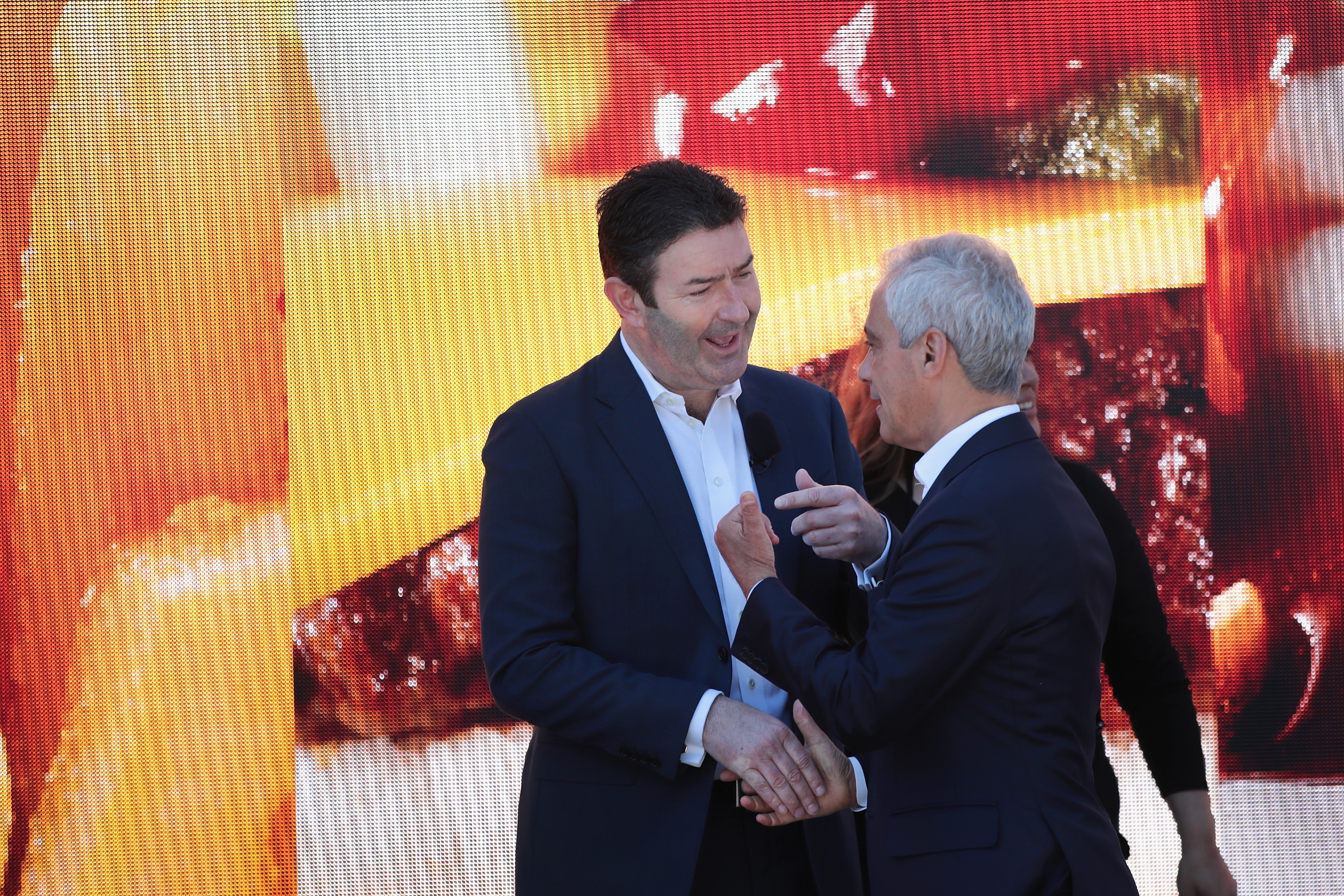 Former McDonald's CEO Steve Easterbrook greets former Chicago Mayor Rahm Emanuel at the unveiling of the company's new corporate headquarters on June 4, 2018 in Chicago, Illinois. (Scott Olson/Getty Images)