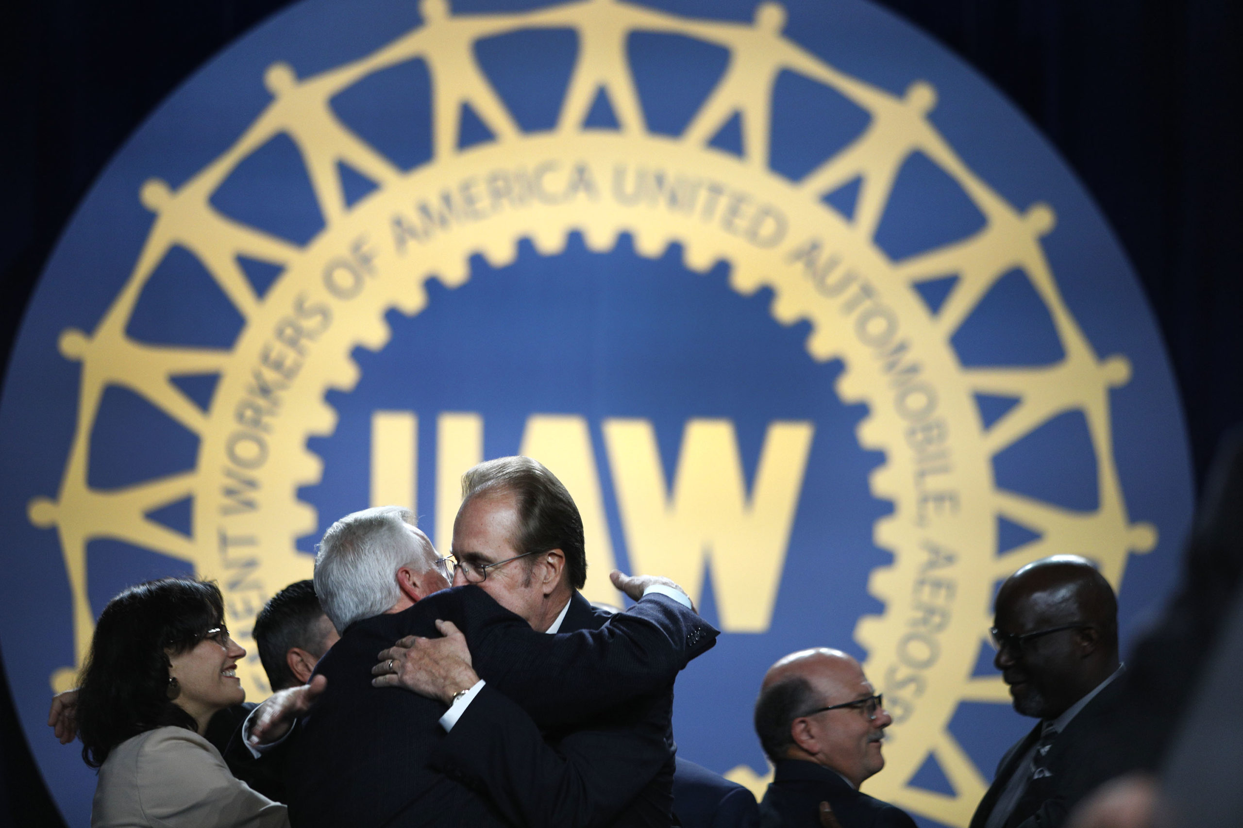 Former UAW president Dennis Williams embraces Gary Jones after Jones was elected the new president at the 37th UAW Constitutional Convention in 2018. (Bill Pugliano/Getty Images)