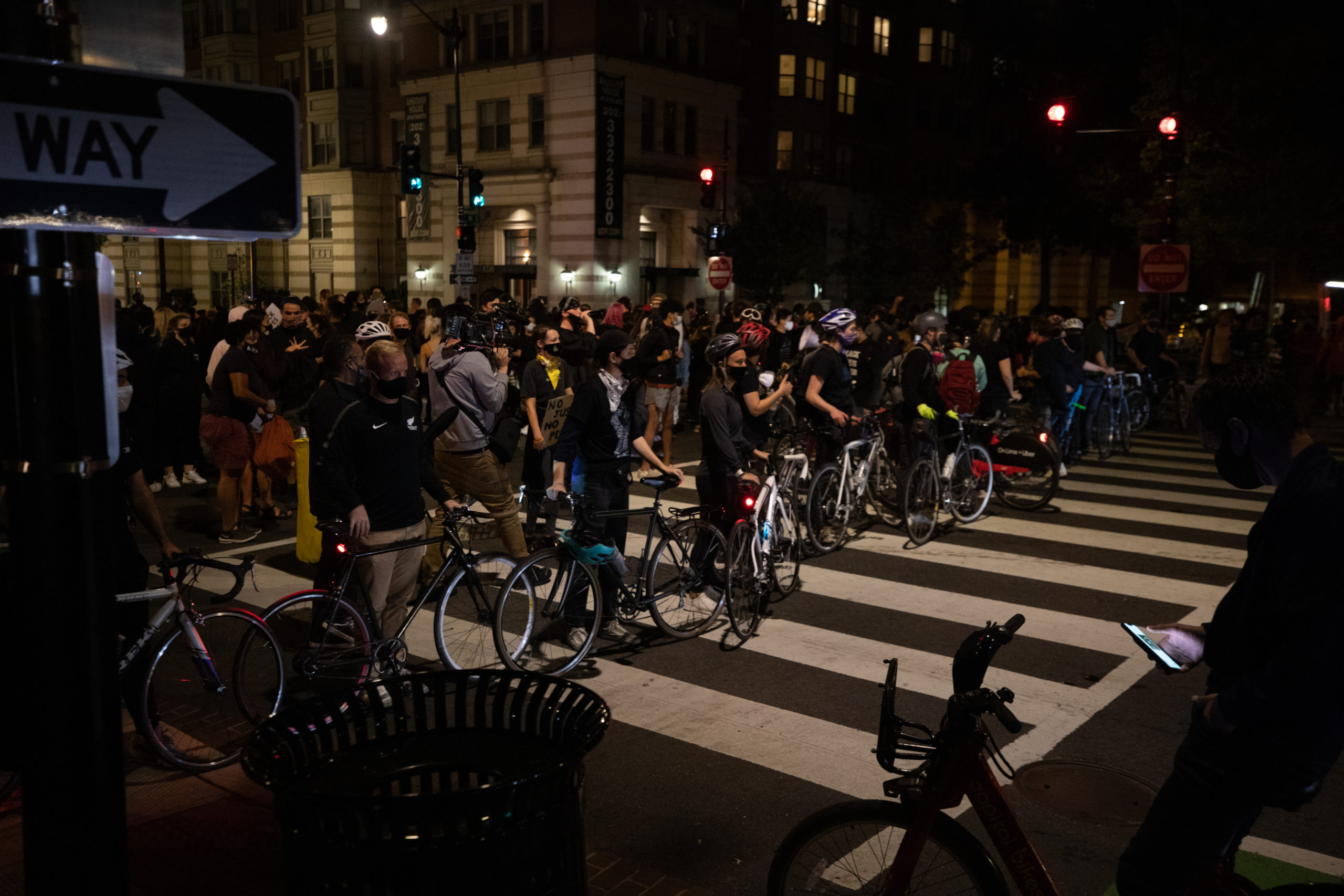 Protesters formed their own bike line to keep Metropolitan Police Officers from getting too close to people on foot in Washington, D.C. on Sept. 23. (Photo: Kaylee Greenlee / DCNF)