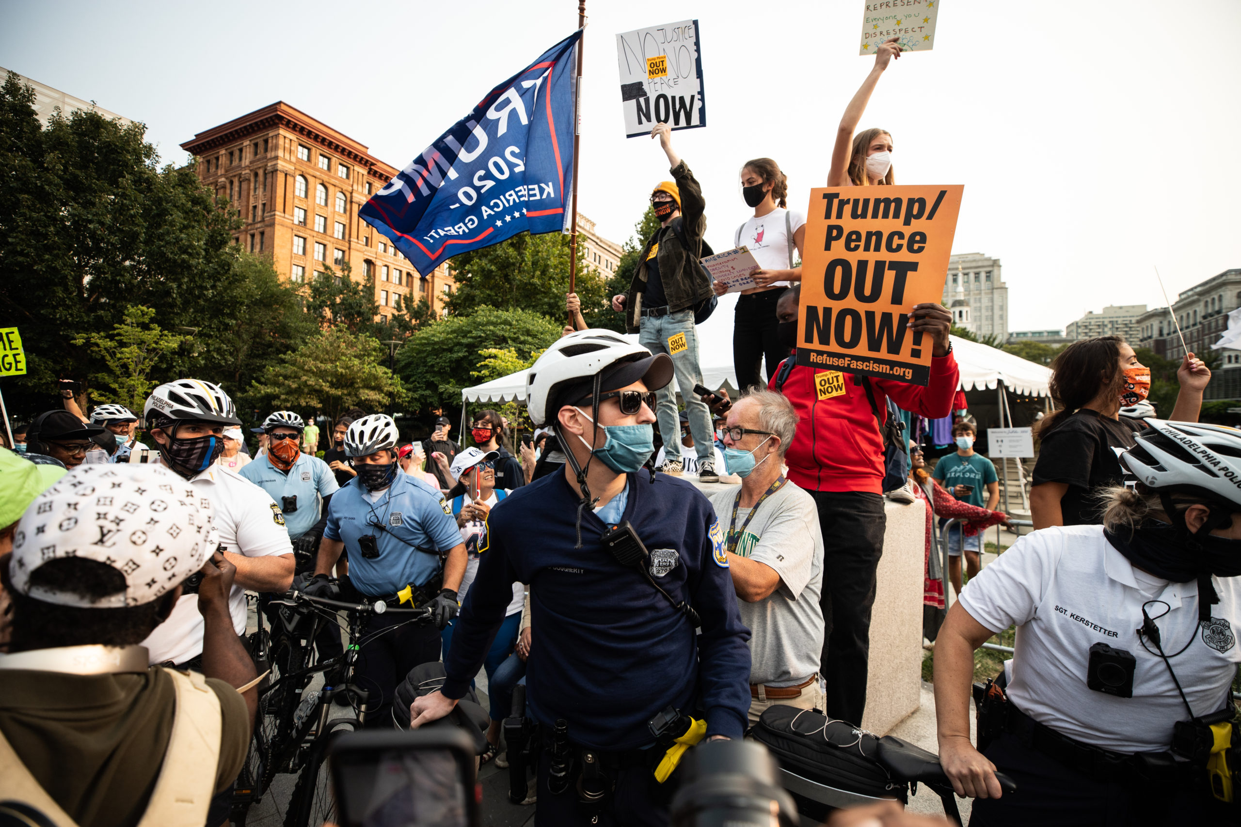 Police form a bike line between Trump supporters and protesters in Philadelphia, Pennsylvania on Sept. 15, 2020. (Photo: Kaylee Greenlee / DCNF)