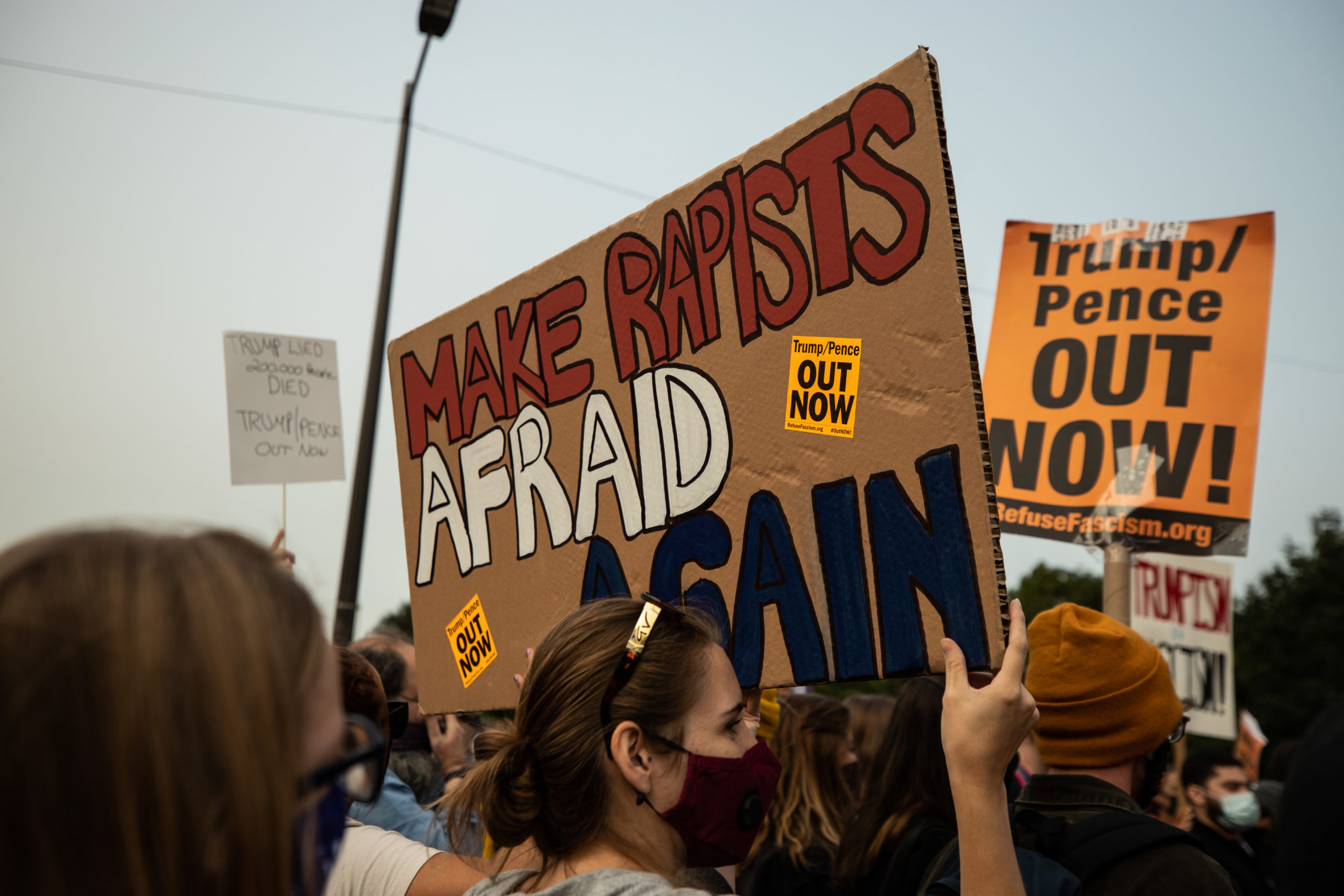 A protester holds a sign saying "make rapists afraid again" in Philadelphia, Pennsylvania on Sept. 15, 2020. (Photo: Kaylee Greenlee / DCNF)
