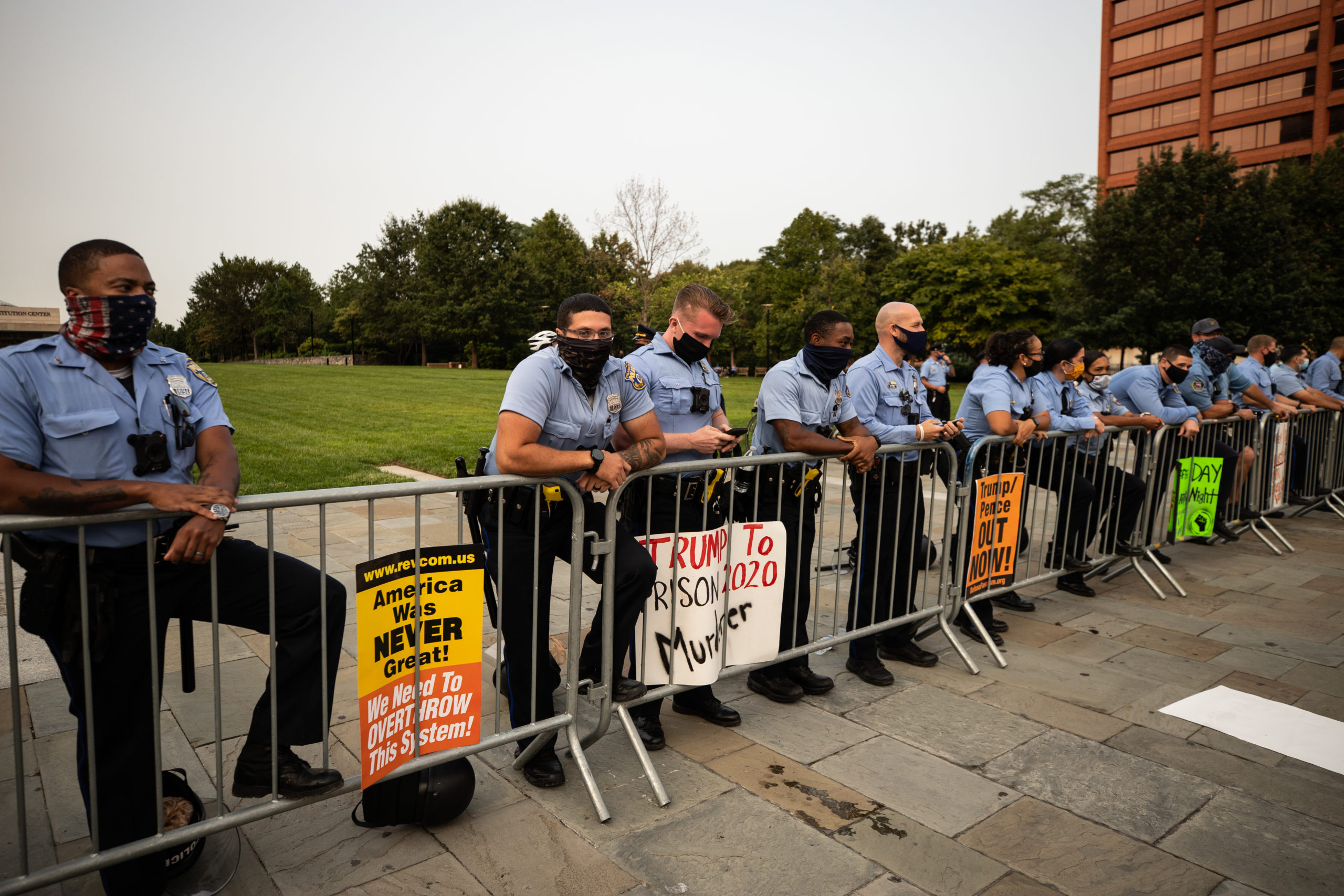 Police officers watch protesters in Philadelphia, Pennsylvania on Sept. 15, 2020. (Photo: Kaylee Greenlee / DCNF)
