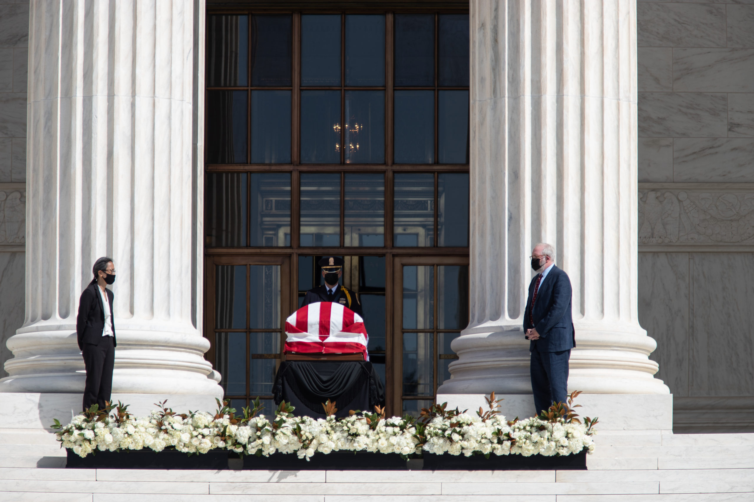 Ruth Bader Ginsburg's flag-draped casket lies in repose on the steps of the Supreme Court for the public to pay respects on Sept. 23, 2020. (Photo: Kaylee Greenlee / DCNF)