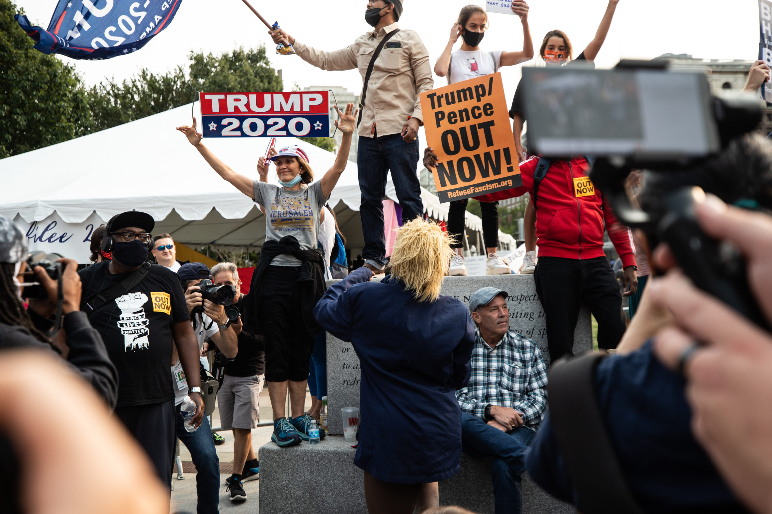 A woman holds a Trump 2020 sign in Philadelphia, Pennsylvania on Sept. 15, 2020. (Photo: Kaylee Greenlee / DCNF)