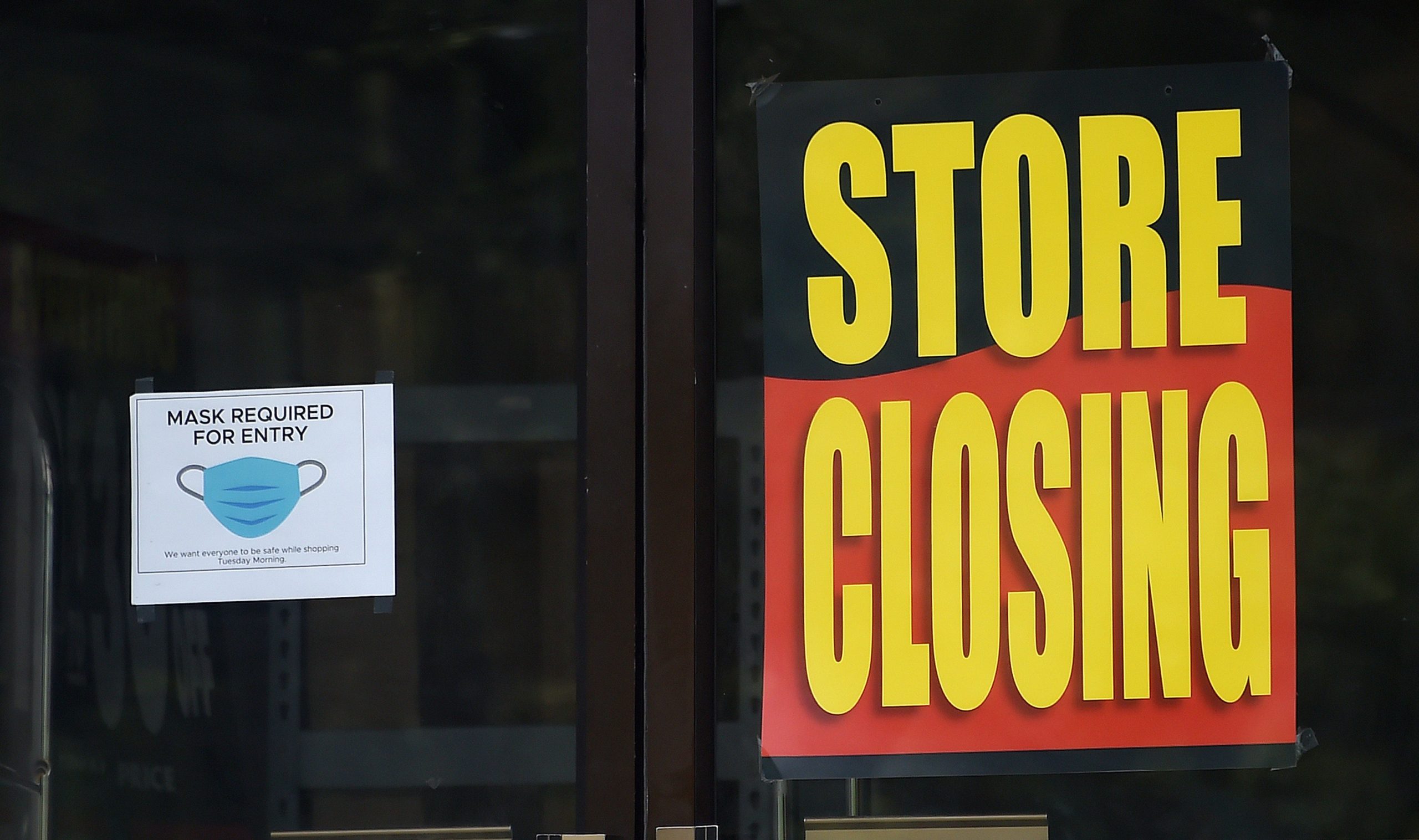 A store displays a sign before closing down permanently as more businesses feel the effects of stay-at-home orders amid the coronavirus pandemic, on June 16, 2020 in Arlington, Virginia. (Photo by Olivier DOULIERY / AFP) (Photo by OLIVIER DOULIERY/AFP via Getty Images)