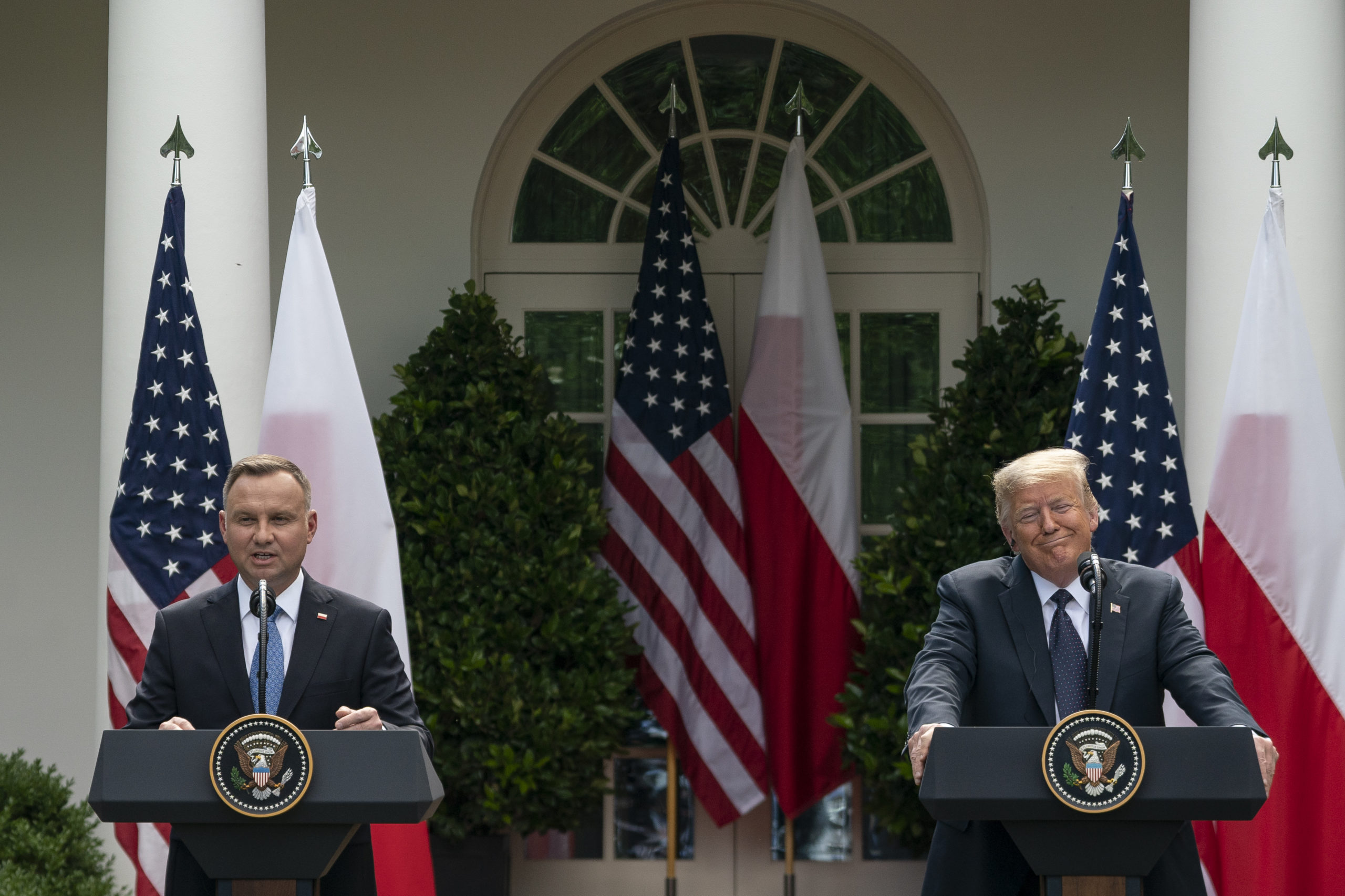 WASHINGTON, DC - JUNE 24: (L-R) Polish President Andrzej Duda speaks as U.S. President Donald Trump looks on during a joint news conference in the Rose Garden of the White House on June 24, 2020 in Washington, DC. Duda, who faces a tight re-election contest in four days, is Trump's first world-leader visit from overseas since the coronavirus pandemic began. (Photo by Drew Angerer/Getty Images)