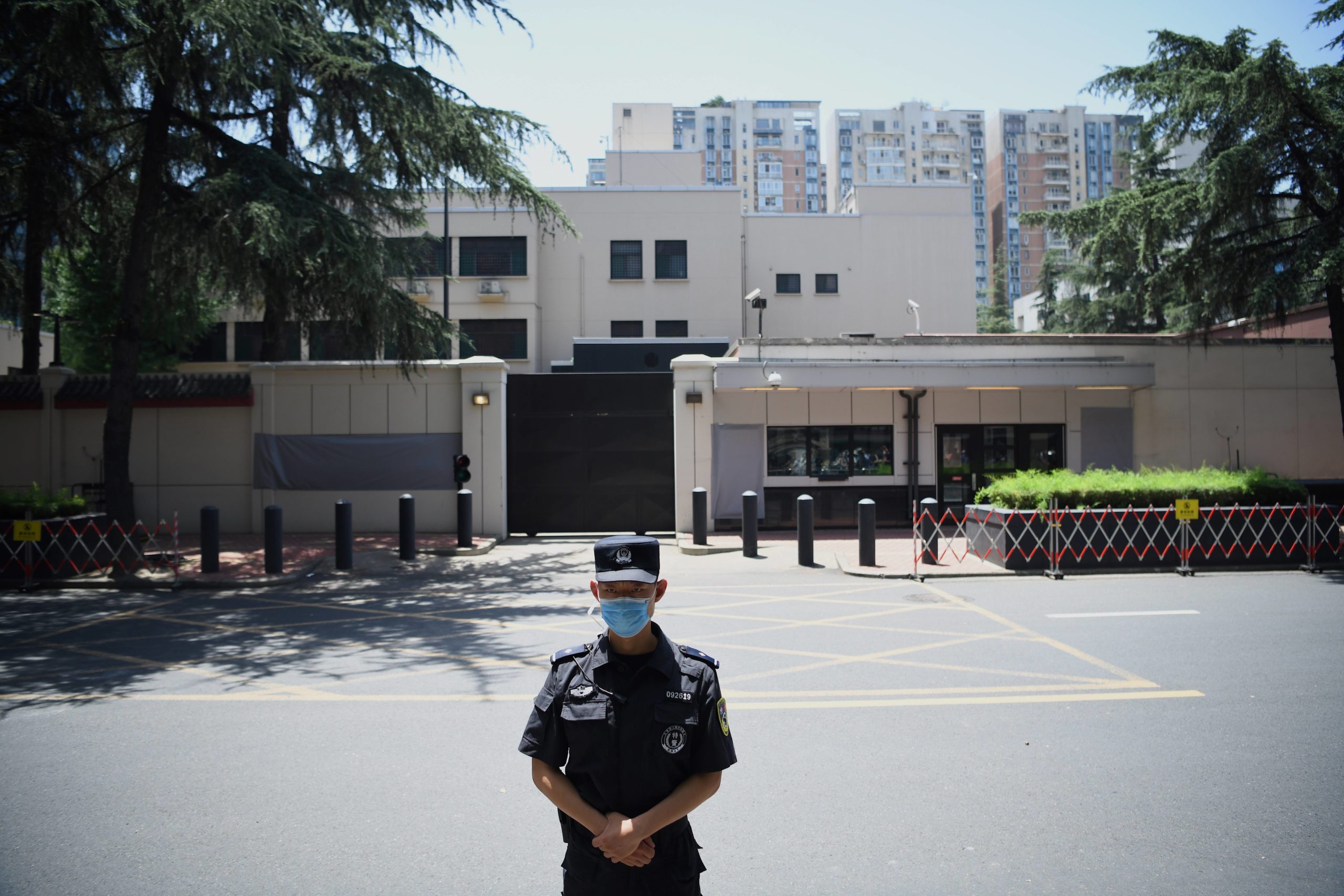 A policeman stands in front of the US Consulate in Chengdu, southwestern China's Sichuan province, on July 27, 2020. - Chinese authorities took over the United States consulate in Chengdu, the foreign ministry said, days after Beijing ordered it to close in retaliation for the shuttering of its mission in Houston. (Photo by Noel Celis / AFP) (Photo by NOEL CELIS/AFP via Getty Images)