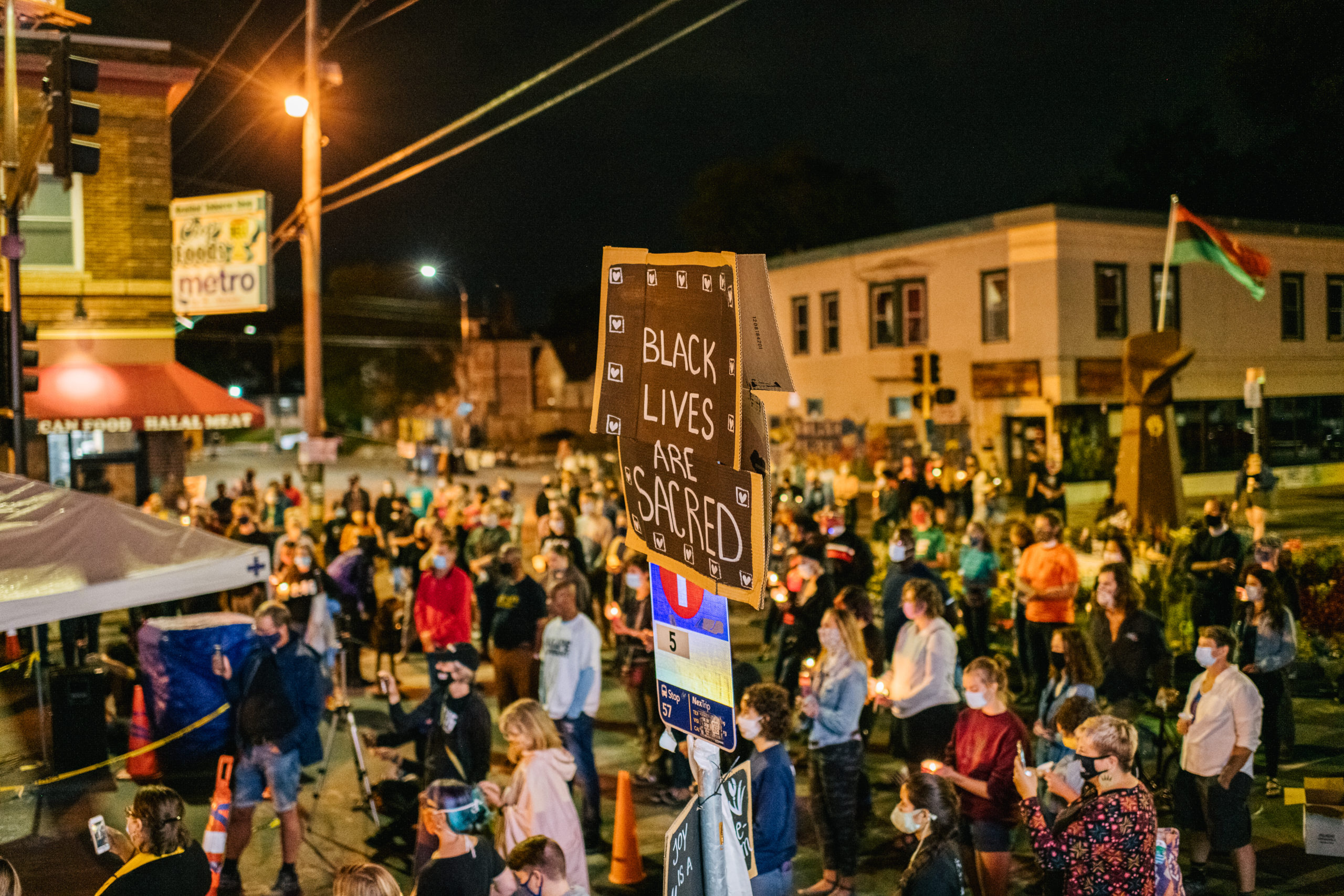 MINNEAPOLIS, MN - AUGUST 30: Demonstrators participate in a candlelight vigil on August 30, 2020 in Minneapolis, Minnesota. The community gathered in the intersection of 38th Street and Chicago Ave for a candlelight vigil to honor Jacob Blake, 29, who was shot on August 23. Video filmed of the incident appears to show Blake shot multiple times in the back by Wisconsin police officers while attempting to enter the drivers side of a vehicle. The 29-year-old Blake was undergoing surgery for a severed spinal cord, shattered vertebrae and severe damage to organs, according to the family attorneys in published accounts. (Photo by Brandon Bell/Getty Images)