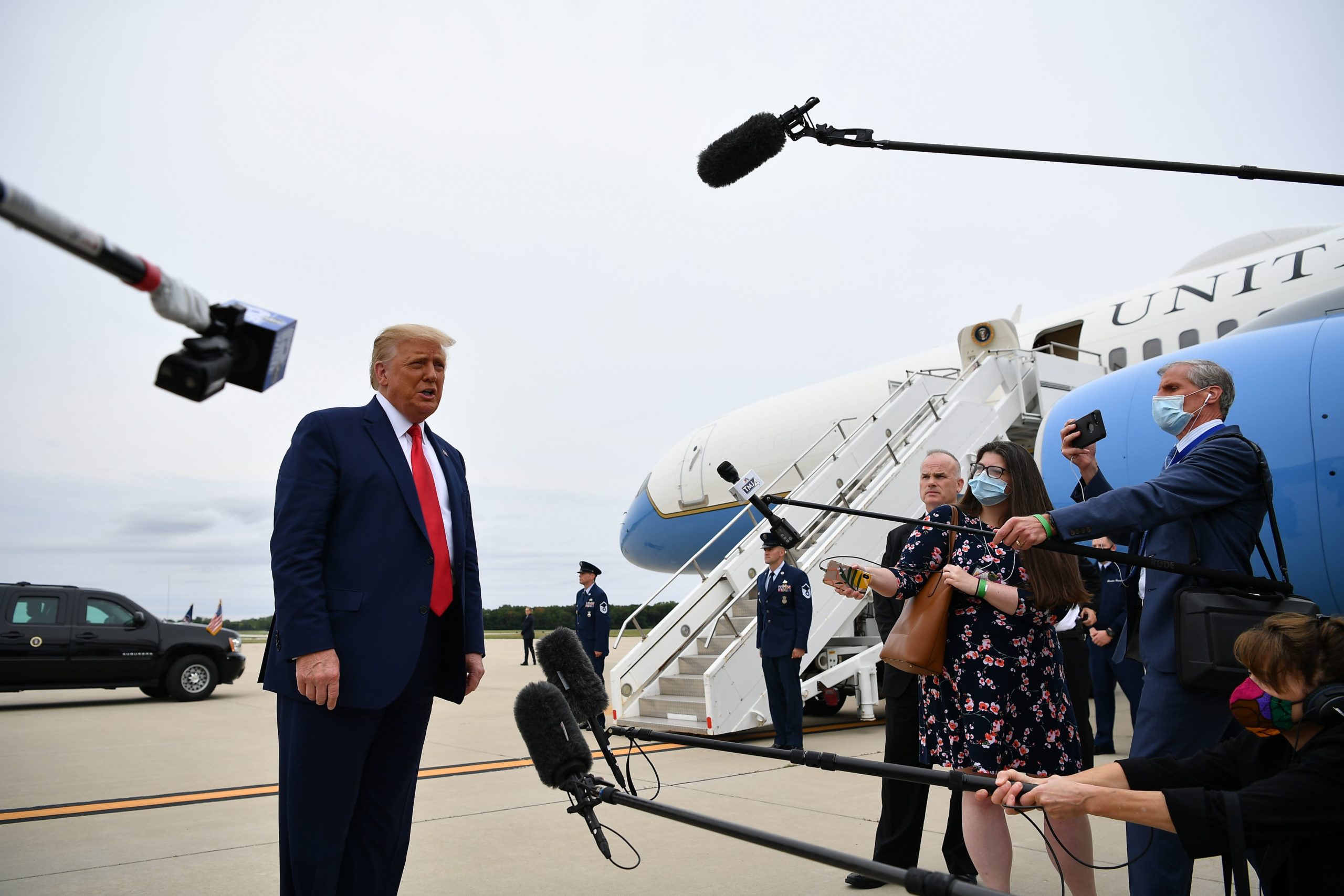US President Donald Trump speaks to the media as he makes his way to board Air Force One before departing from Andrews Air Force Base in Maryland on September 1, 2020, heading to Kenosha, Wisconsin to meet with law enforcement officials and to survey damage following civil unrest in the city. (Photo by MANDEL NGAN / AFP) (Photo by MANDEL NGAN/AFP via Getty Images)