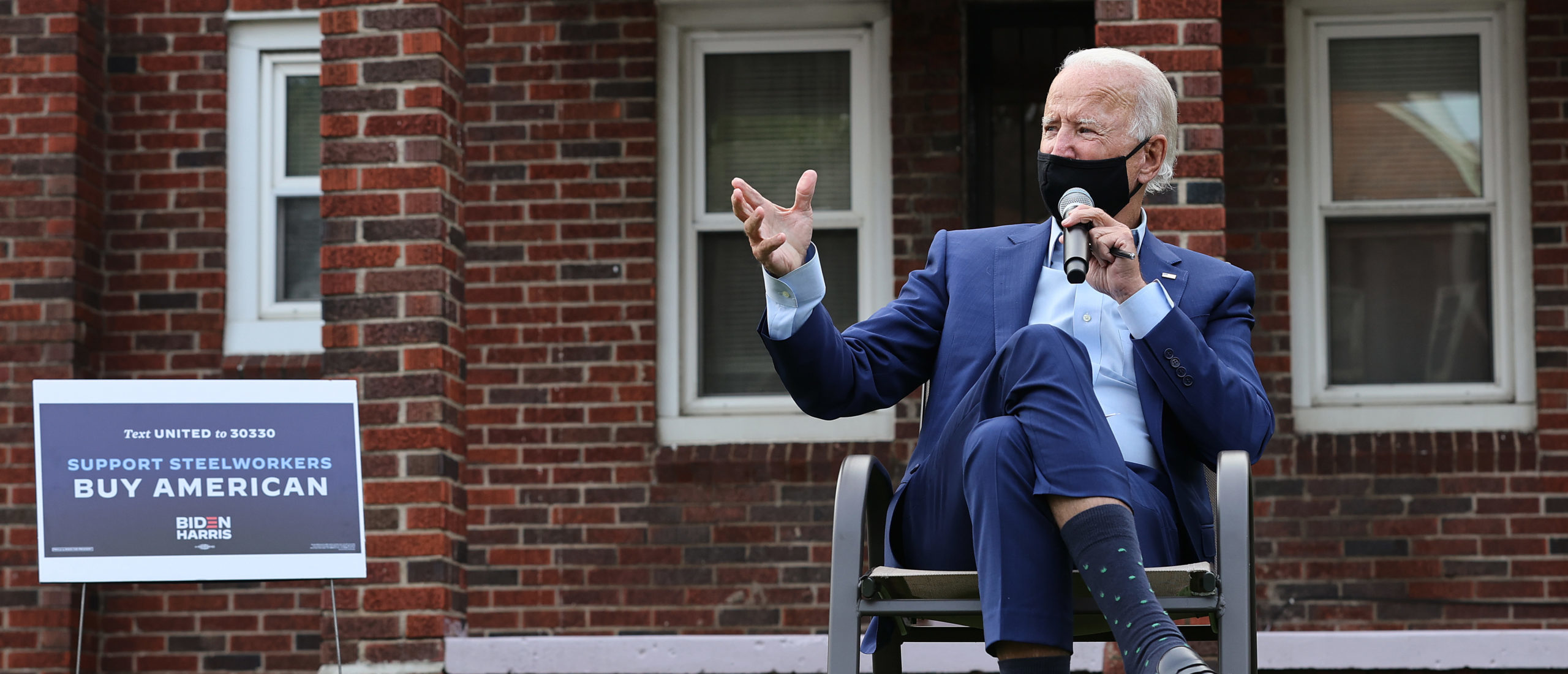 DETROIT, MICHIGAN - SEPTEMBER 09: Wearing a face mask to reduce the risk posed by the coronavirus, Democratic presidential nominee Joe Biden talks with members of the United Steelworkers union in a supporter's back yard September 09, 2020 in Detroit, Michigan. Biden is campaigning in Michigan, which President Donald Trump won in 2016 by less than 11,000 votes, the narrowest margin of victory in state's presidential election history. (Photo by Chip Somodevilla/Getty Images)