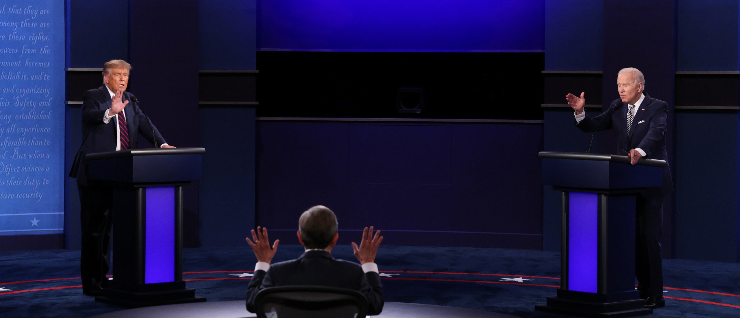 CLEVELAND, OHIO - SEPTEMBER 29: U.S. President Donald Trump and Democratic presidential nominee Joe Biden participate in the first presidential debate moderated by Fox News anchor Chris Wallace (C) at the Health Education Campus of Case Western Reserve University on September 29, 2020 in Cleveland, Ohio. This is the first of three planned debates between the two candidates in the lead up to the election on November 3. (Photo by Scott Olson/Getty Images)