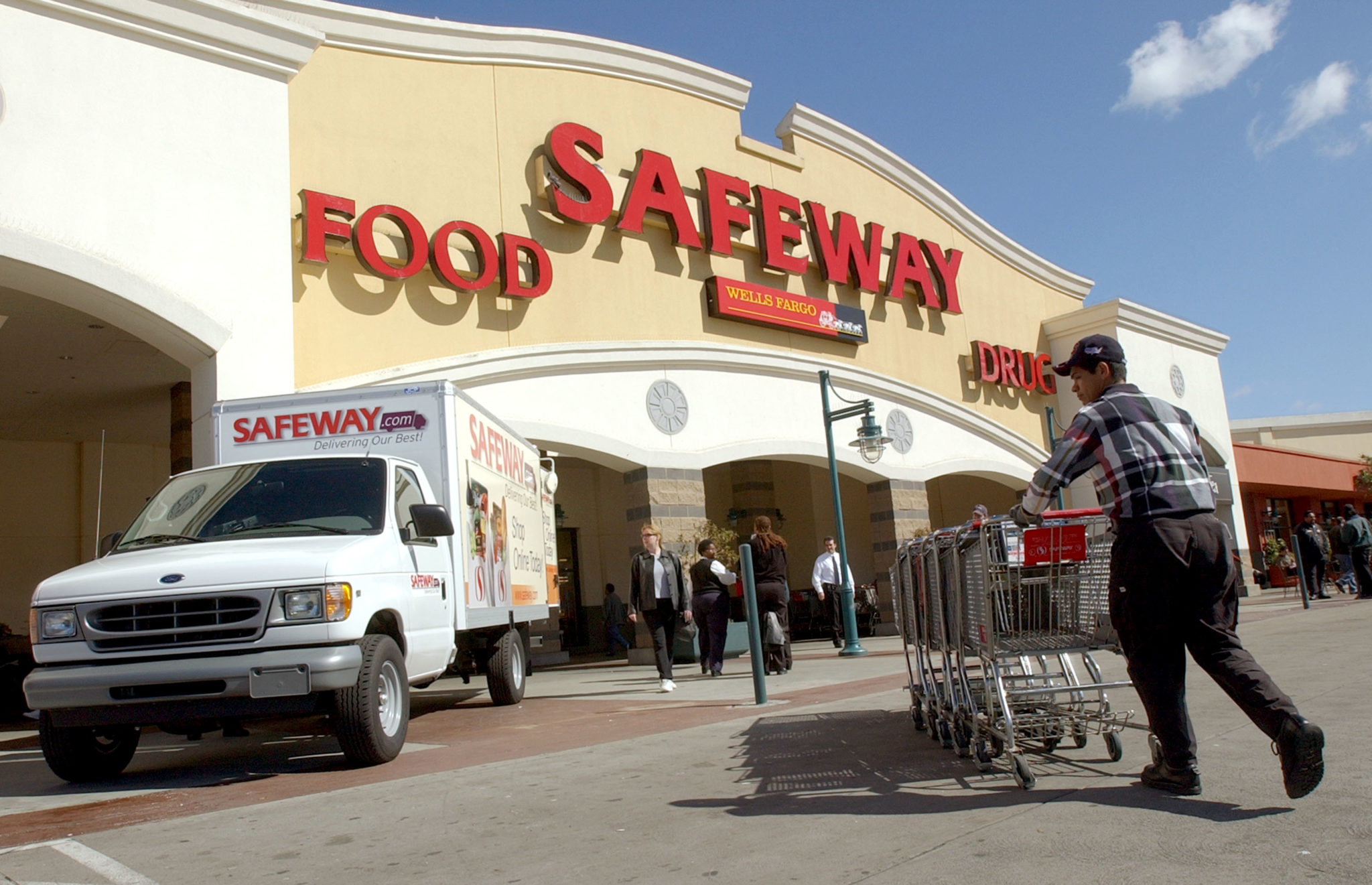 A new Safeway.com delivery van is parked in front of a Safeway store March ...
