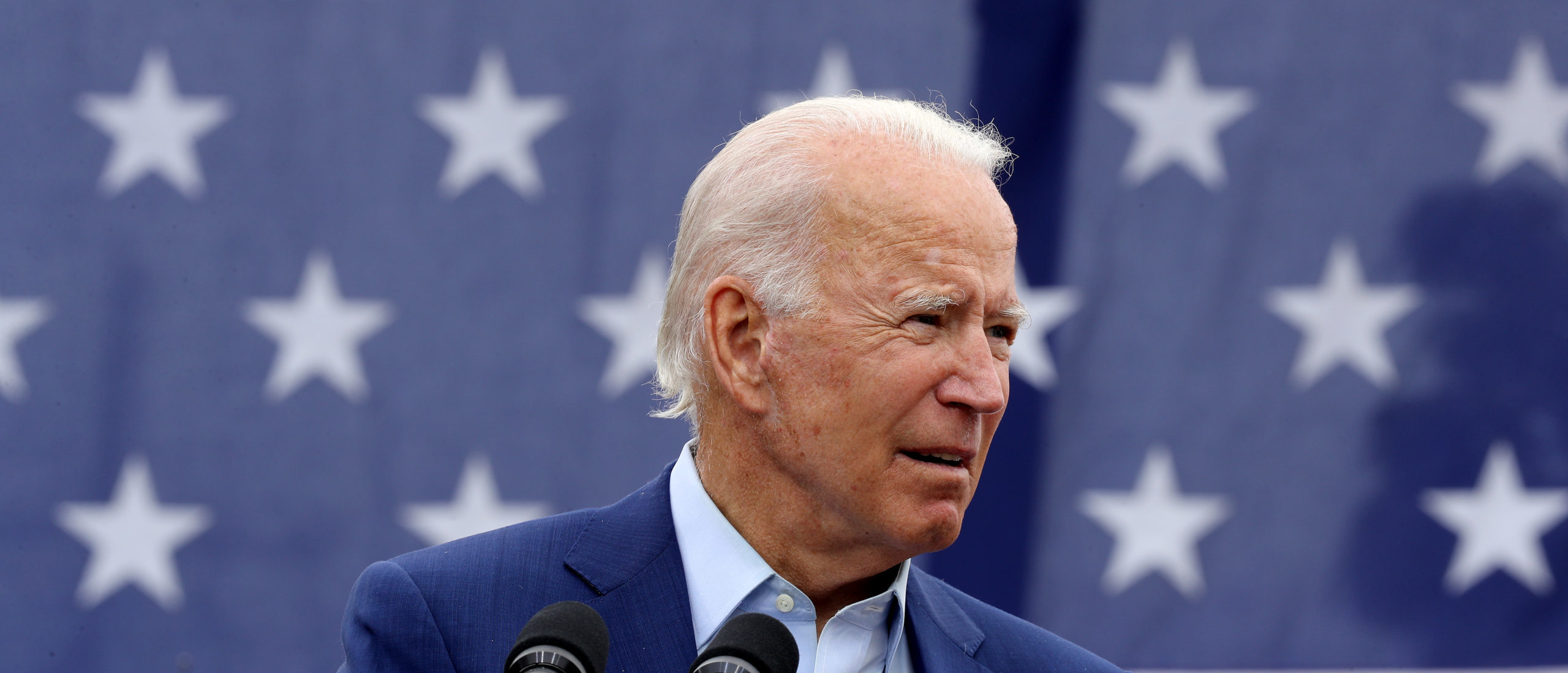 WARREN, MICHIGAN - SEPTEMBER 09: Democratic presidential nominee and former Vice President Joe Biden delivers remarks in the parking lot outside the United Auto Workers Region 1 offices on September 09, 2020 in Warren, Michigan. Biden is campaigning in Michigan, a state President Donald Trump won in 2016 by less than 11,000 votes, the narrowest margin of victory in state's presidential election history. (Photo by Chip Somodevilla/Getty Images)