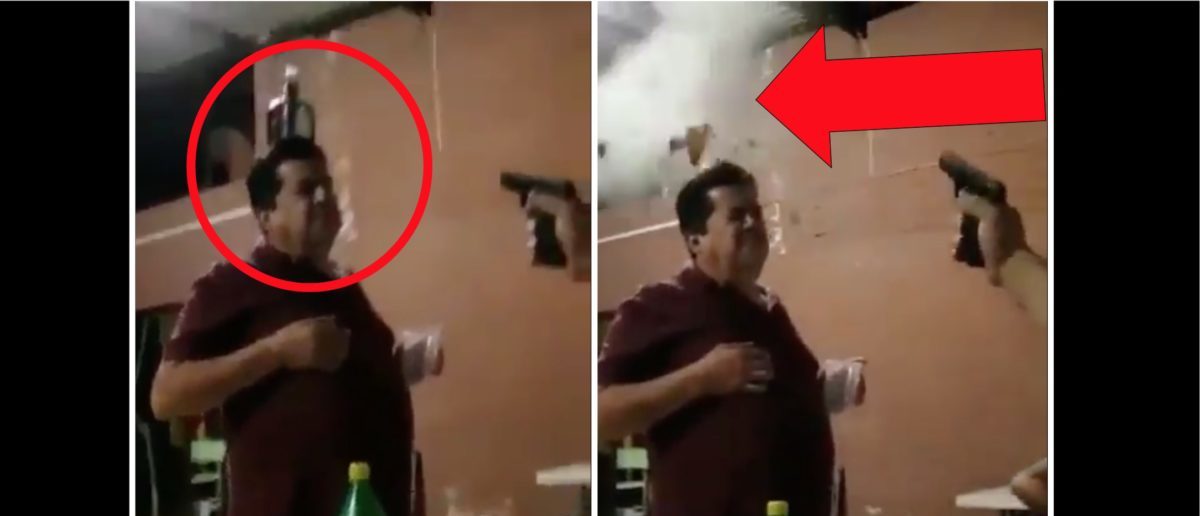 Man Gets A Bottle Of Alcohol Shot Off Of His Head In Crazy Video The