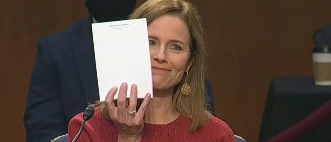 Amy Coney Barrett Holds Up Empty Notepad During ...