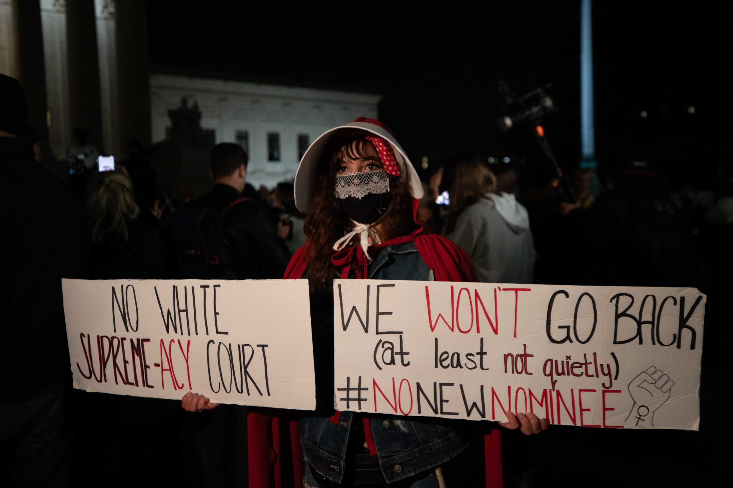 An anti-Amy Coney Barrett protester dressed as a handmaid just before the results of the Senate vote to confirm Amy Coney Barrett in Washington, D.C. on October 26, 2020. (Kaylee Greenlee - Daily Caller News Foundation)