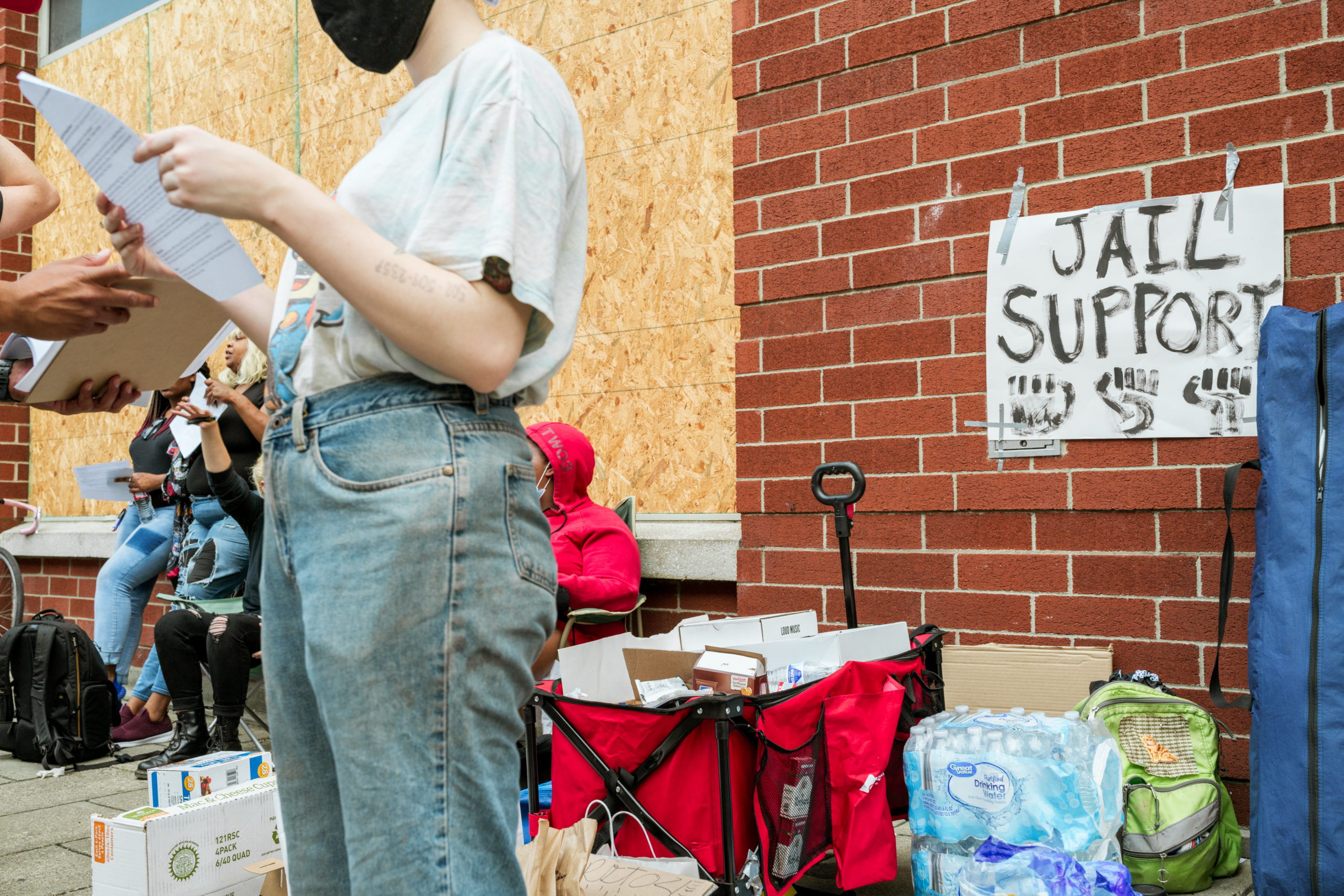 Protesters organize supplies to support demonstrators recently released from jail on September 24, 2020 in Louisville, Kentucky. (Jon Cherry/Getty Images)