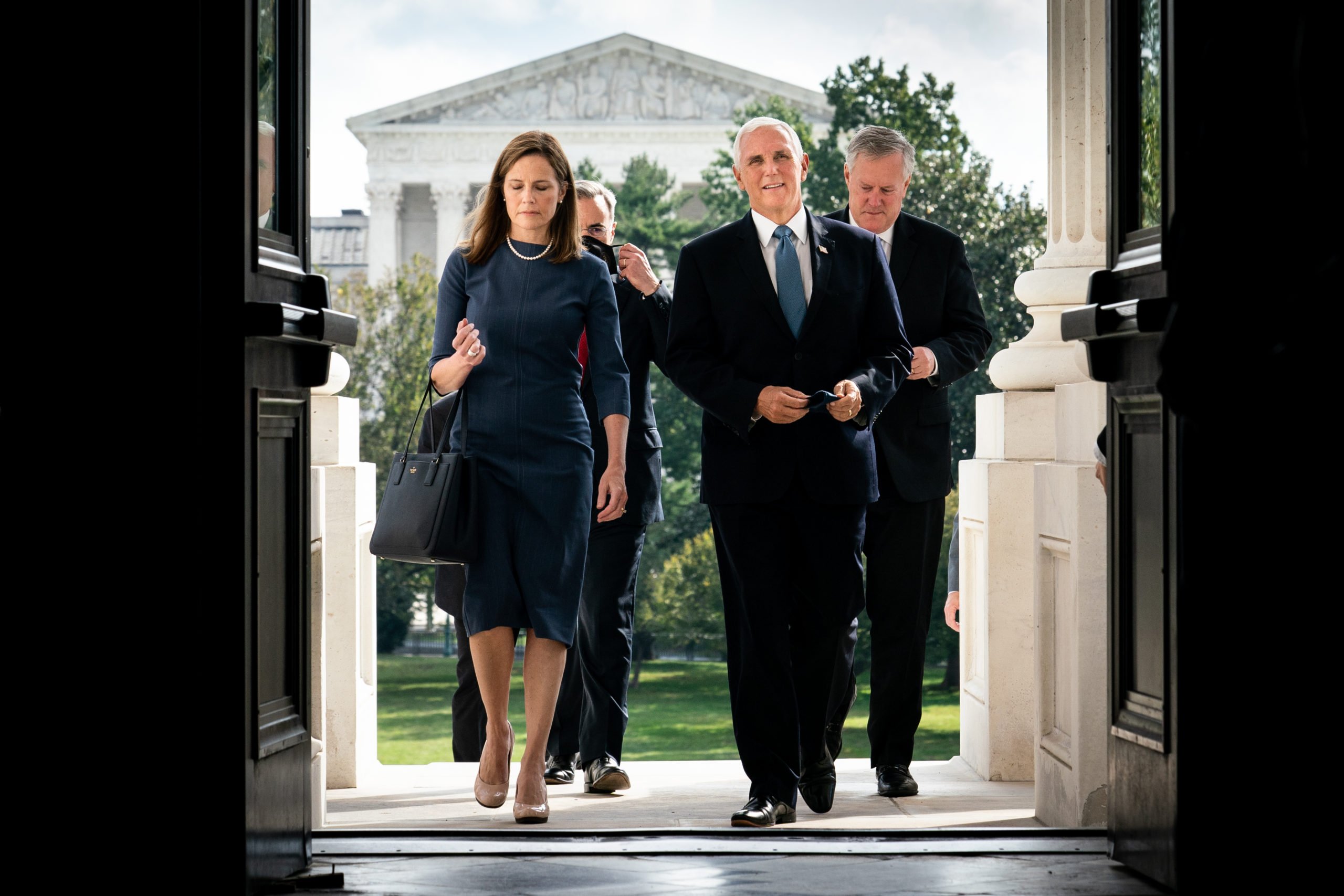 WASHINGTON, DC - SEPTEMBER 29: Seventh U.S. Circuit Court Judge Amy Coney Barrett, President Donald Trump's nominee for the U.S. Supreme Court, and Vice President Mike Pence arrive at the U.S. Capitol where Barrett is attending a series of meetings in preparation for her confirmation hearing, on September 29, 2020 in Washington, DC. (Photo by Erin Schaff-Pool/Getty Images)