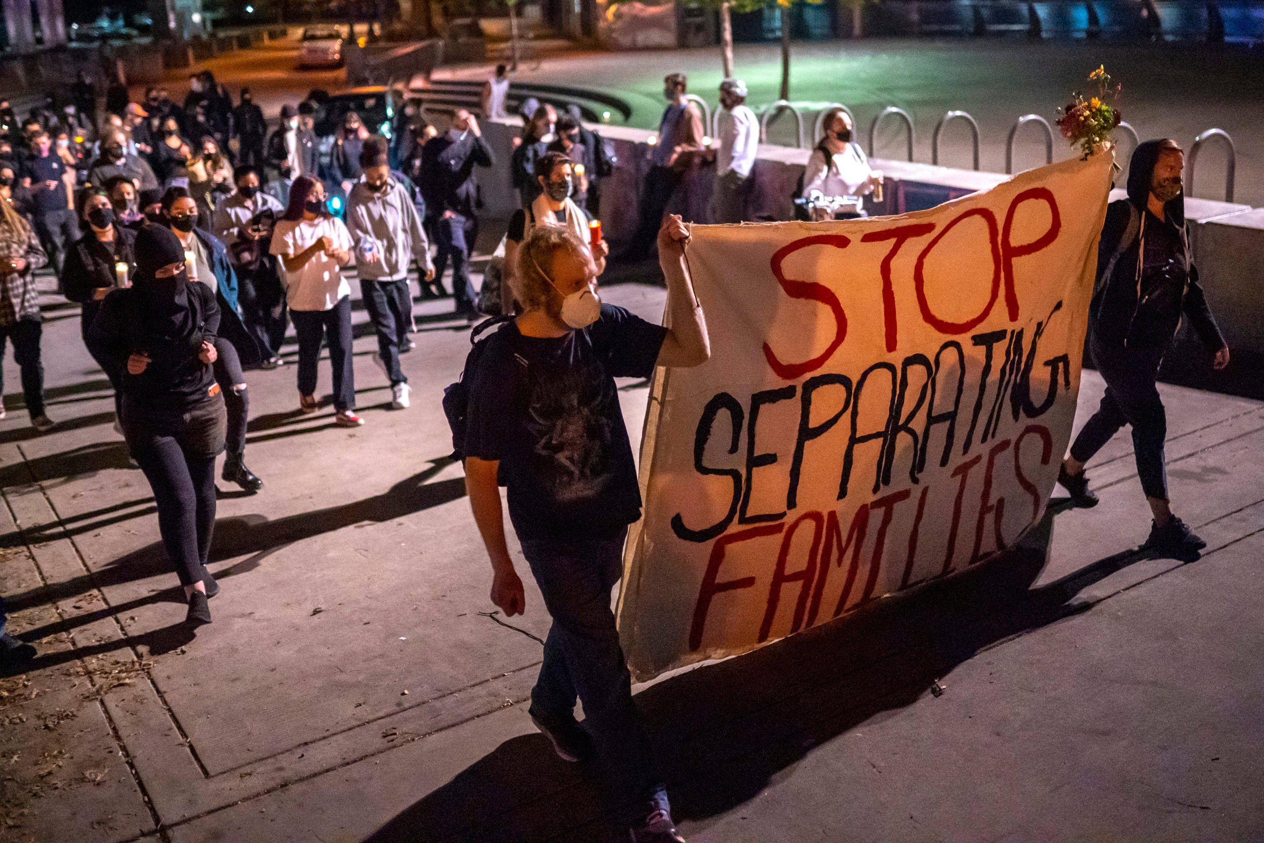 Activists march along the waterfront during a protest against the Immigration and Customs Enforcement agency on Oct. 3 in Portland, Oregon. (Nathan Howard/Getty Images)