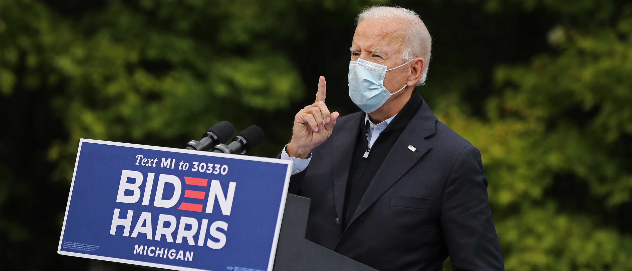 GRAND RAPIDS, MICHIGAN - OCTOBER 02: Democratic presidential nominee Joe Biden delivers remarks in the parking lot of the United Food and Commercial Workers International Union Local 951 while campaigning October 02, 2020 in Grand Rapids, Michigan. (Photo by Chip Somodevilla/Getty Images)