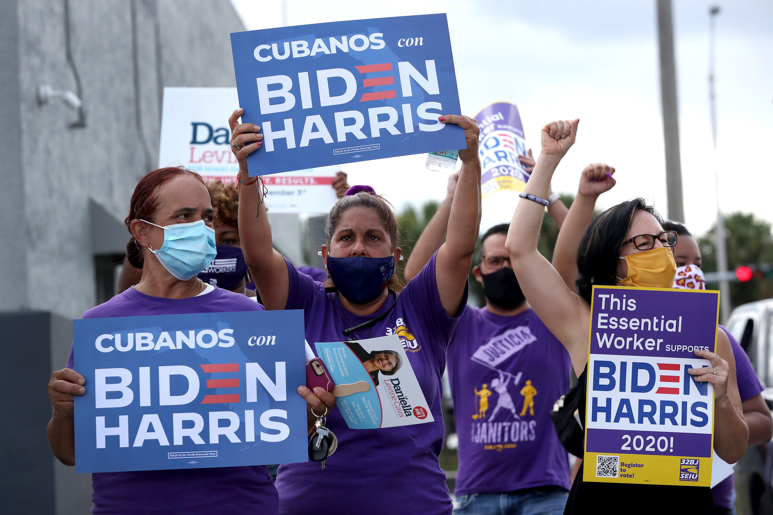 People, including SEIU members, show their support for Democratic presidential nominee Joe Biden on Oct. 11 in Miami Springs, Florida. (Joe Raedle/Getty Images)