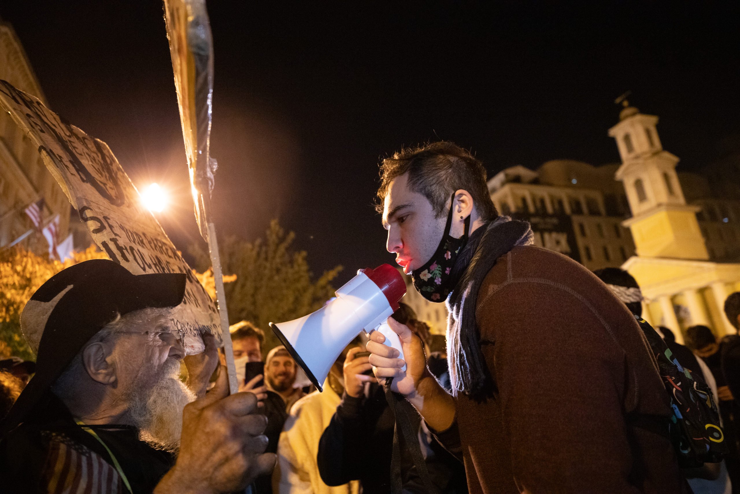 A self-identified Jewish man got in a heated argument with an older man protesting the circumcision of children at Black Lives Matter Plaza in Washington, D.C. on Nov. 7, 2020. (Kaylee Greenlee - Daily Caller News Foundation)