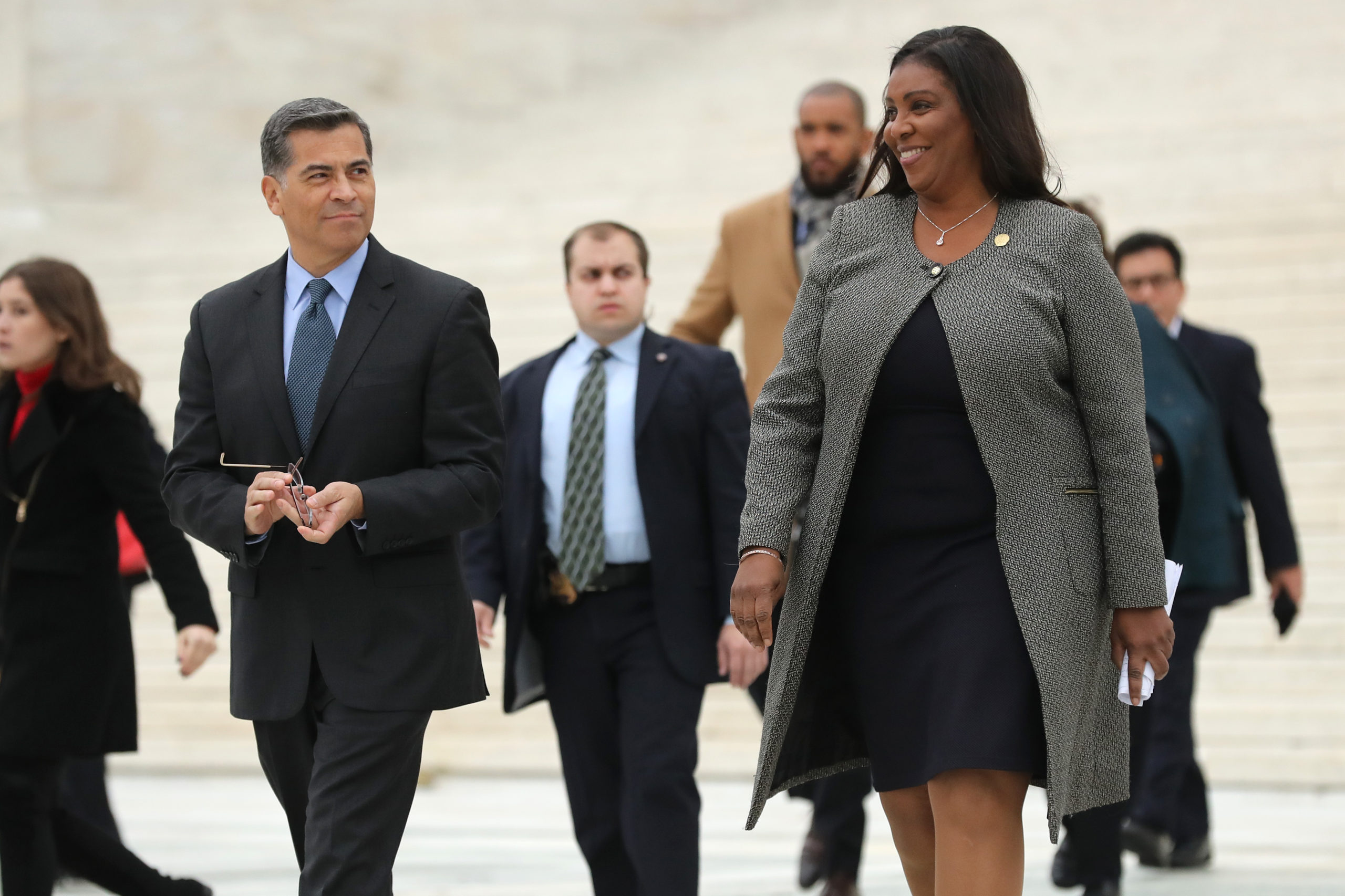 California Attorney General Xavier Becerra and New York Attorney General Letitia James walk out of the Supreme Court following arguments in a case about the Deferred Action on Childhood Arrivals program on November 12, 2019 in Washington, D.C. (Chip Somodevilla/Getty Images)