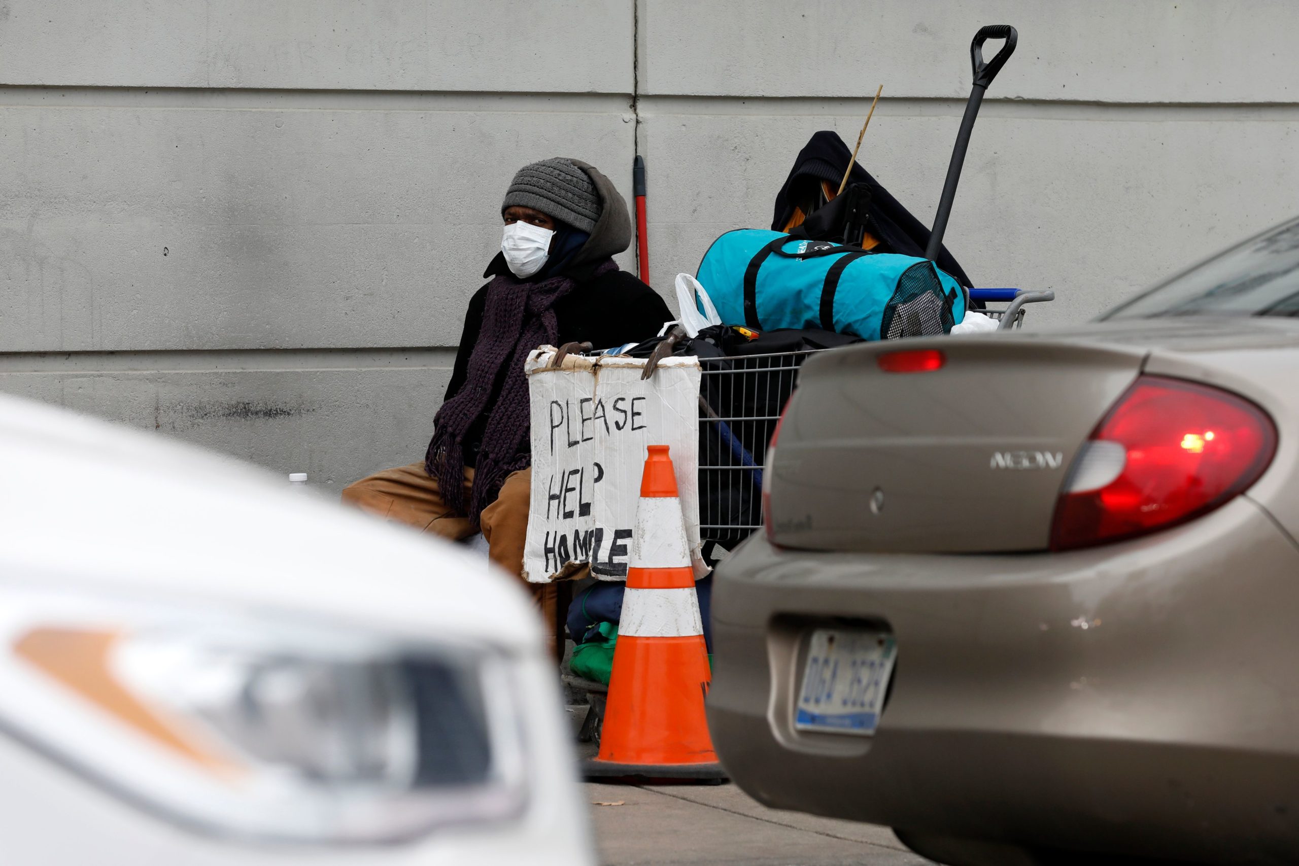 A homeless person wearing a protective mask is pictured in Highland Park, Michigan on March 30. (Jeff Kowalsky/AFP via Getty Images)
