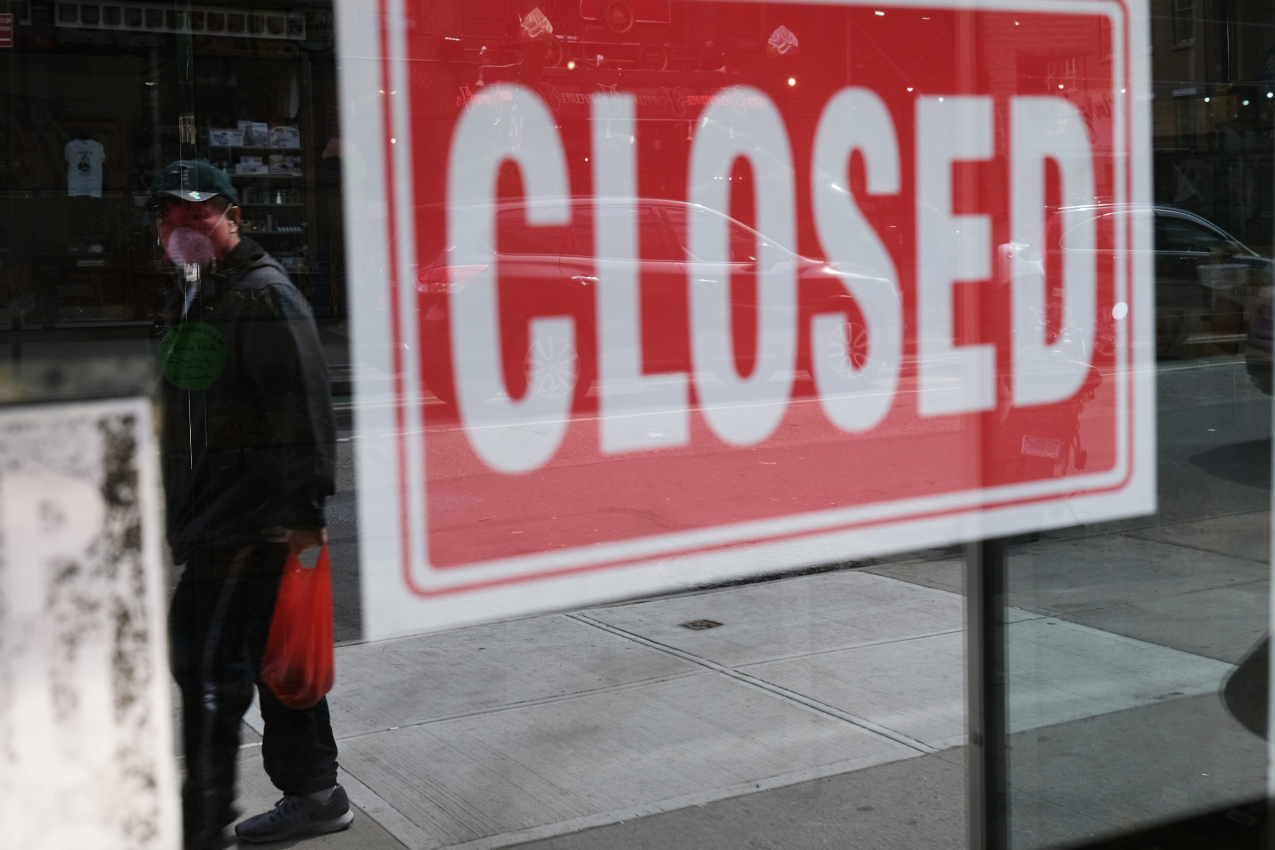 NEW YORK, NY - APRIL 21: A store stands closed as the coronavirus keeps financial markets and businesses mostly closed on April 21, 2020 in New York City. New York City, which has been the hardest hit city in America from COVIT-19, is just starting to see a slowdown in hospital visits and a lowering of the daily death rate from the virus. (Photo by Spencer Platt/Getty Images)