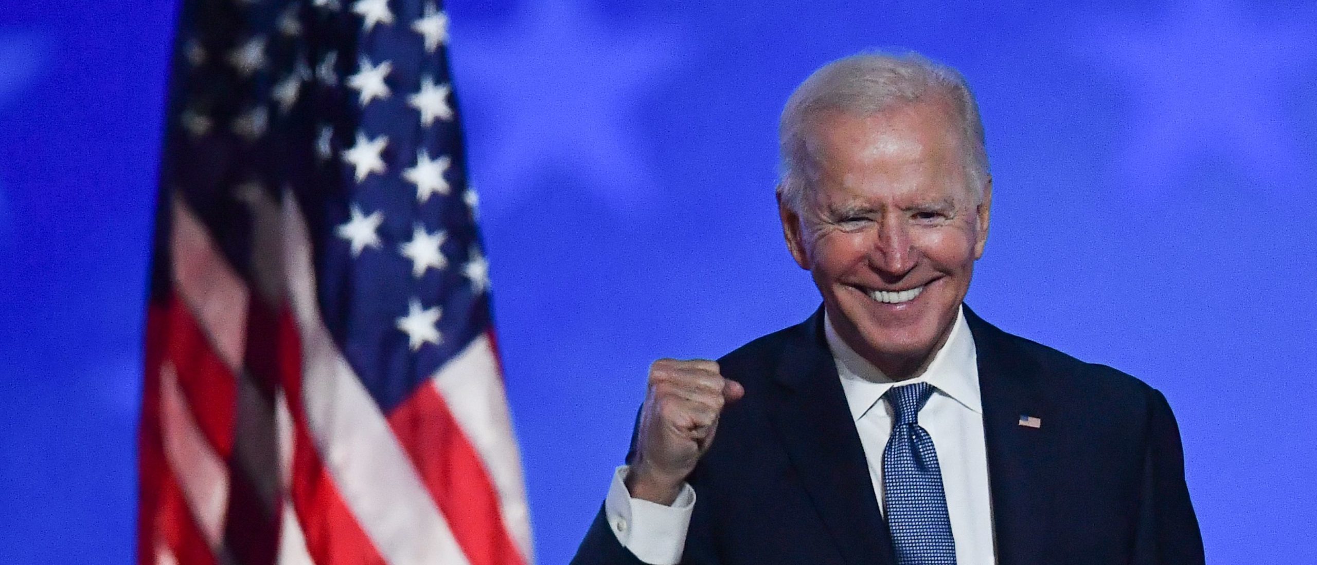 Democratic presidential nominee Joe Biden gestures after speaking during election night at the Chase Center in Wilmington, Delaware, early on November 4, 2020. - Democrat Joe Biden said early Wednesday he believes he is "on track" to defeating US President Donald Trump, and called for Americans to have patience with vote-counting as several swing states remain up in the air. "We believe we are on track to win this election," Biden told supporters in nationally broadcast remarks delivered in his home city of Wilmington, Delaware, adding: "It ain't over until every vote is counted." (Photo by Angela Weiss/AFP via Getty Images)