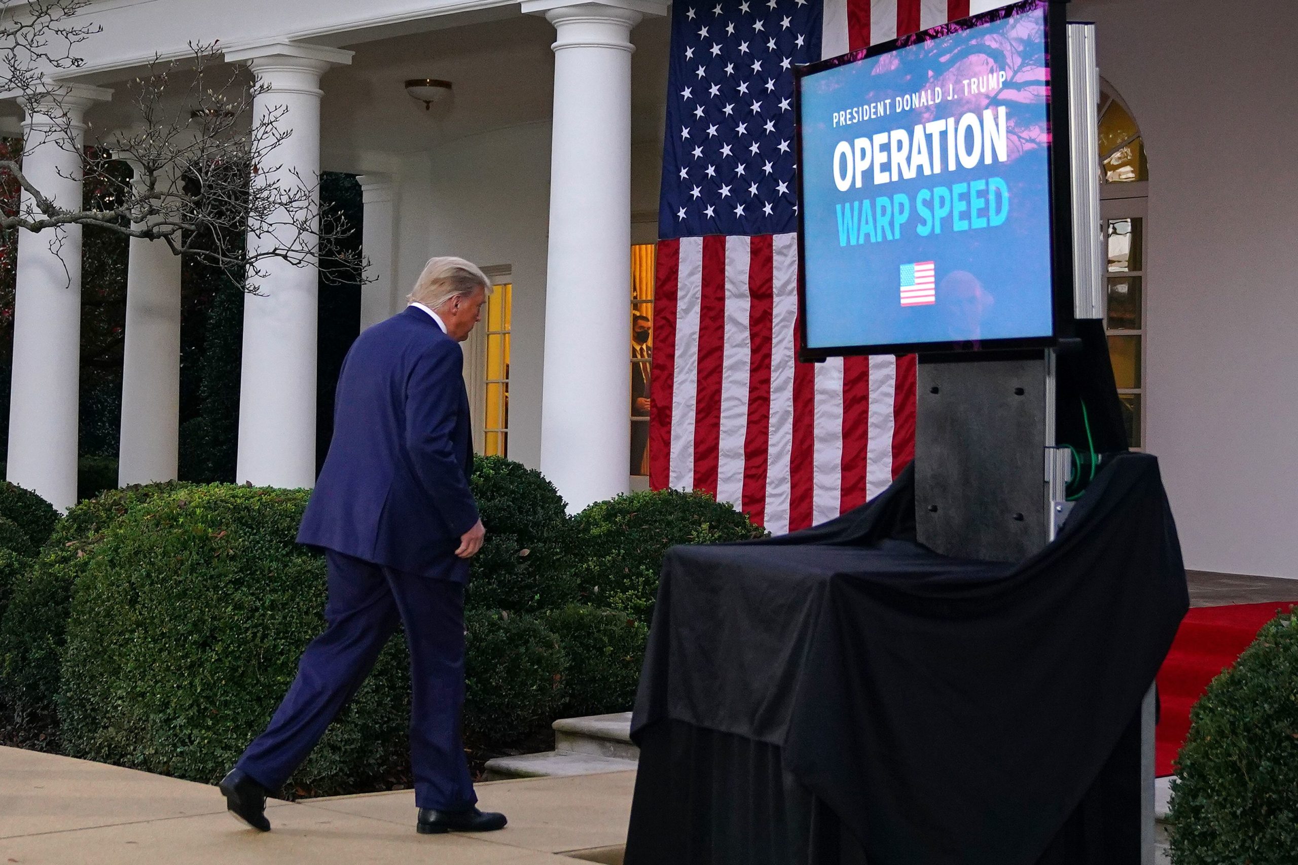 President Donald Trump departs after delivering an update on Operation Warp Speed in the Rose Garden of the White House on Friday. (Mandel Ngan/AFP via Getty Images)