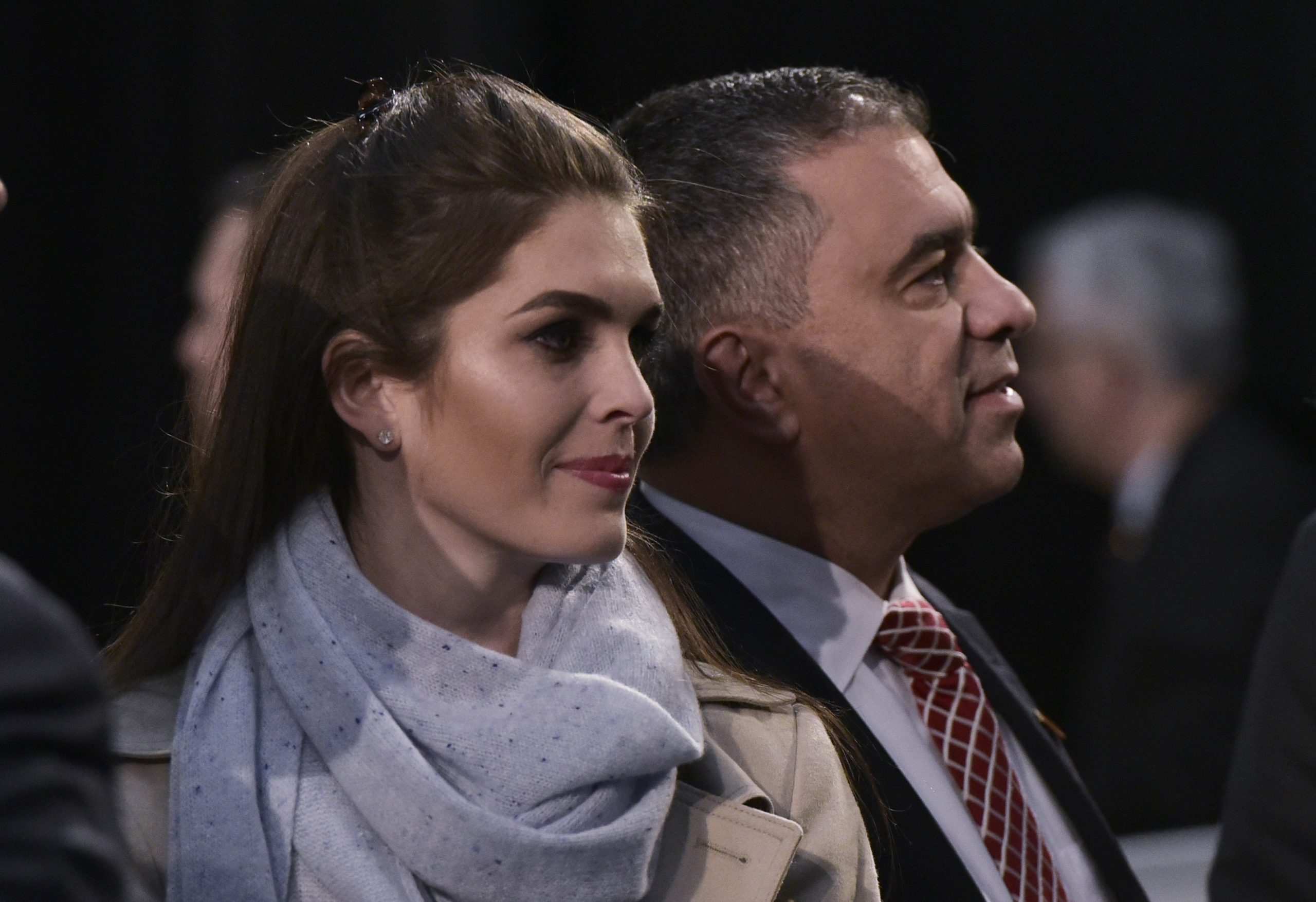 Hope Hicks (L) and David Bossie, Trump deputy campaign manager, watch as Republican presidential nominee Donald Trump addresses the final rally of his 2016 presidential campaign at Devos Place in Grand Rapids, Michigan on November 7, 2016. (MANDEL NGAN/AFP via Getty Images)