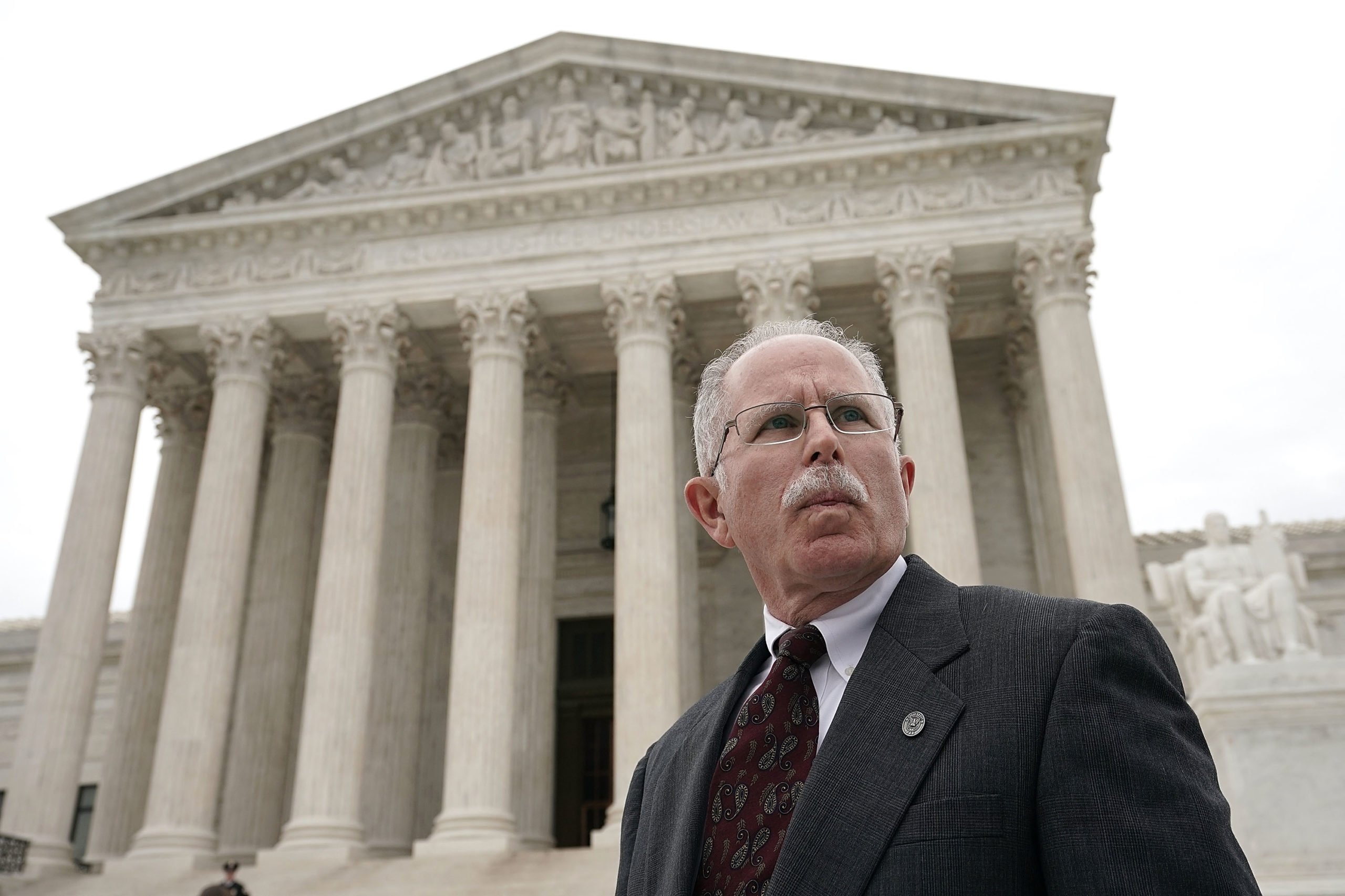 Lead plaintiff in Janus v. AFSCME, Mark Janus passes in front of the Supreme Court after a hearing on Feb. 26, 2018 in Washington, D.C. (Alex Wong/Getty Images)