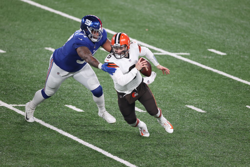 EAST RUTHERFORD, NEW JERSEY - DECEMBER 20: Baker Mayfield #6 of the Cleveland Browns is sacked by Dexter Lawrence #97 of the New York Giants during the third quarter of a game at MetLife Stadium on December 20, 2020 in East Rutherford, New Jersey. (Photo by Al Bello/Getty Images)