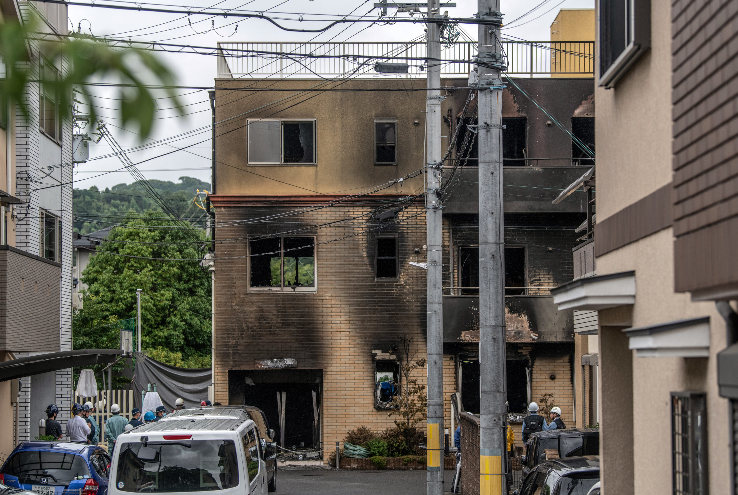 The Kyoto Animation Co studio building is pictured after being set ablaze by an arsonist on July 19, 2019 in Kyoto, Japan. Thirty three people are believed dead and dozens injured after a suspected arson attack on the animation studio. Police were quoted by local media as saying a 41 year-old man broke into the Kyoto Animation Co studio on Thursday morning and sprayed petrol before igniting it. Japan's Prime Minister Shinzo Abe described the incident as 'too appalling for words'. (Photo by Carl Court/Getty Images)
