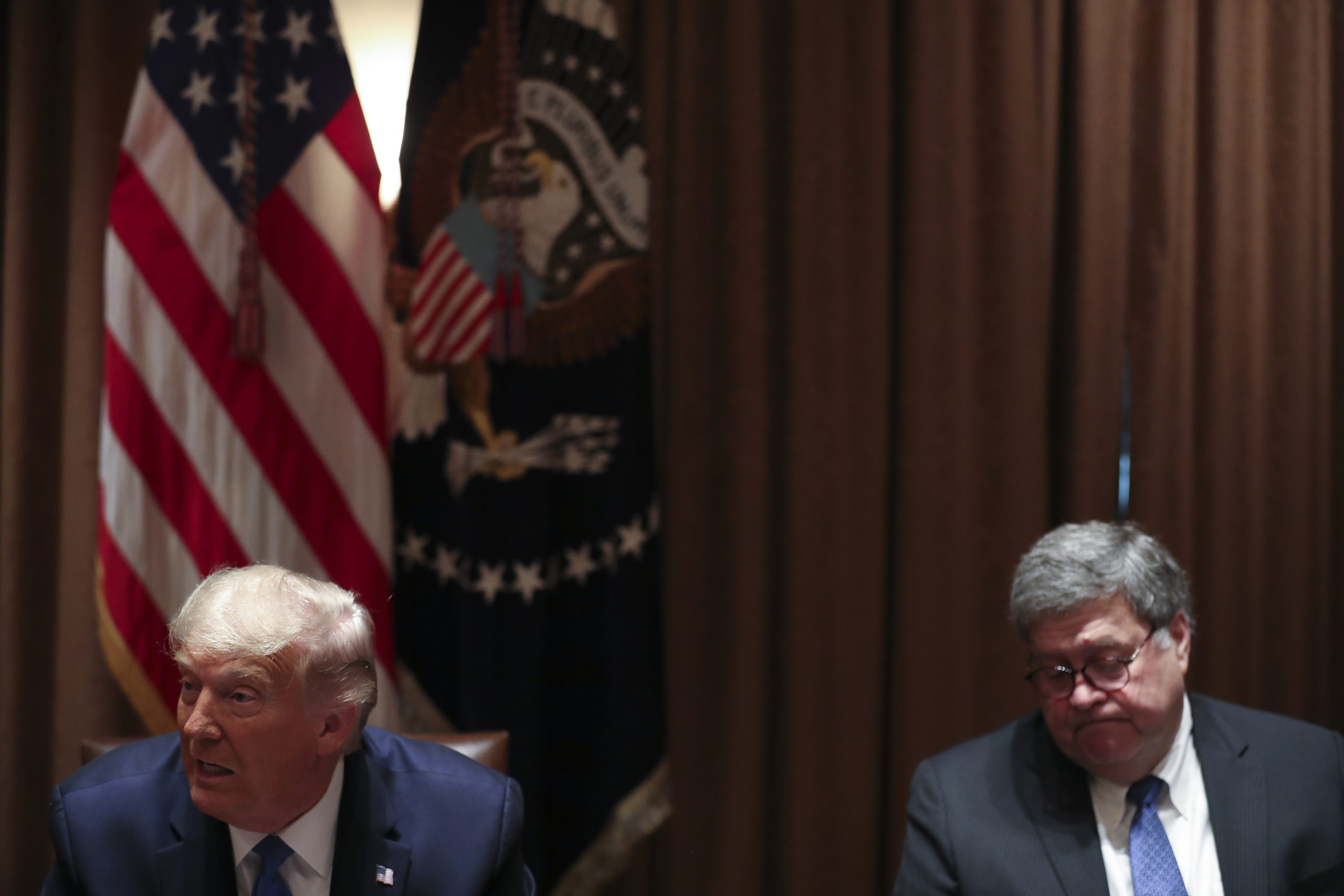 WASHINGTON, DC - SEPTEMBER 23: U.S. President Donald Trump speaks as U.S. Attorney General William Barr listens during a discussion with State Attorneys General on Protecting Consumers from Social Media Abuses in the Cabinet Room of the White House on September 23, 2020 in Washington, DC. (Photo by Oliver Contreras-Pool/Getty Images)