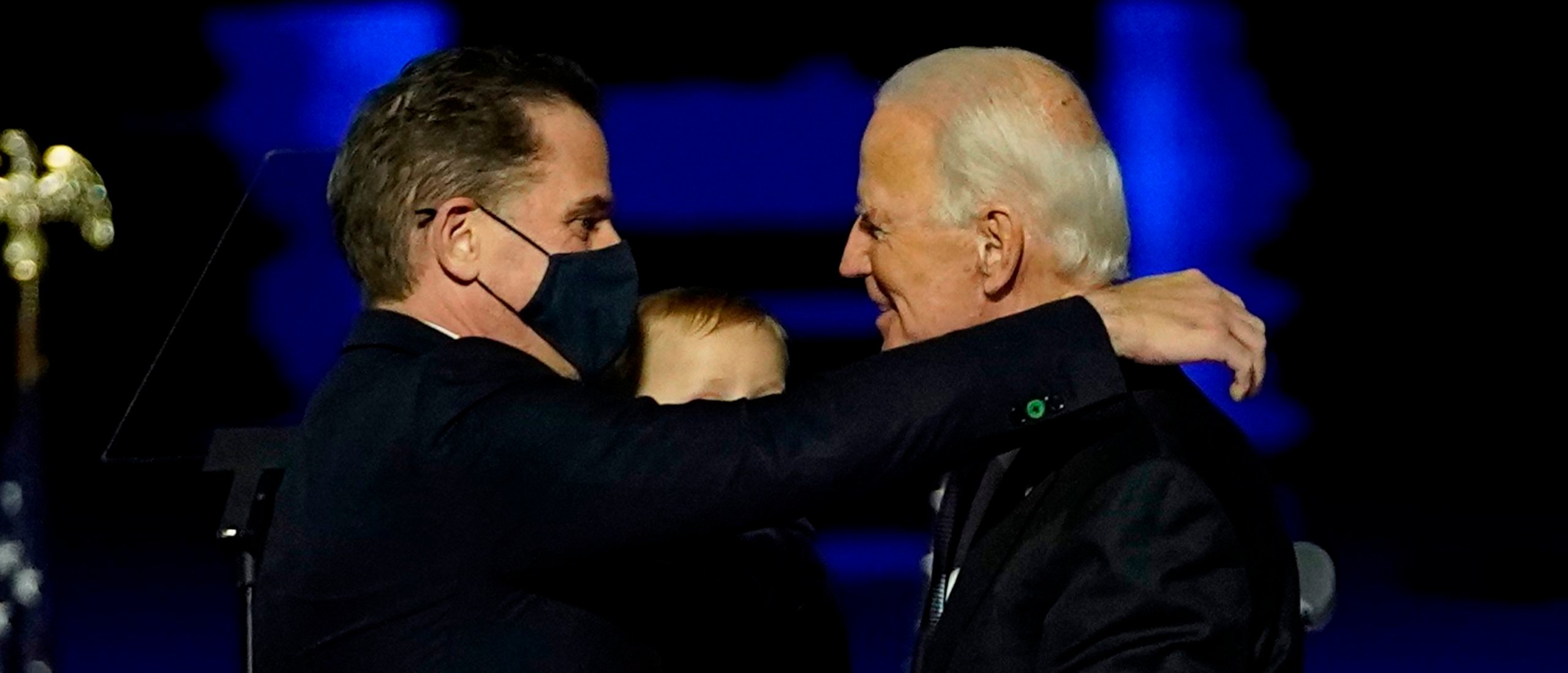 President-elect Joe Biden embraces his son Hunter Biden after addressing the nation from the Chase Center November 07, 2020. (Photo by Andrew Harnik-Pool/Getty Images)