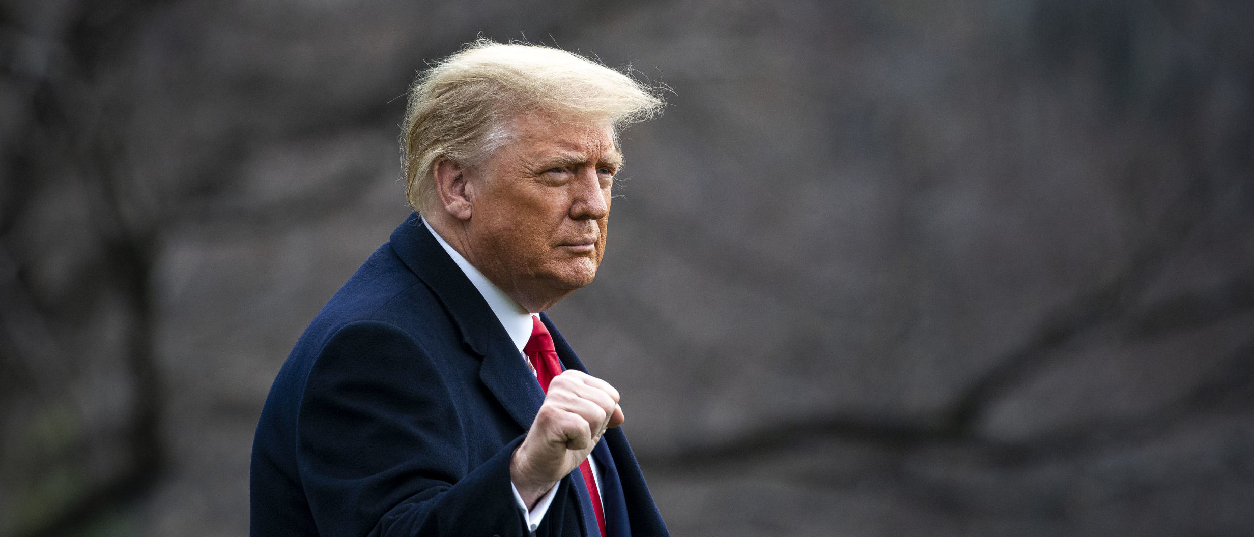 WASHINGTON, DC - DECEMBER 12: U.S. President Donald Trump pumps his fist as he departs on the South Lawn of the White House, on December 12, 2020 in Washington, DC. (Al Drago/Getty Images)