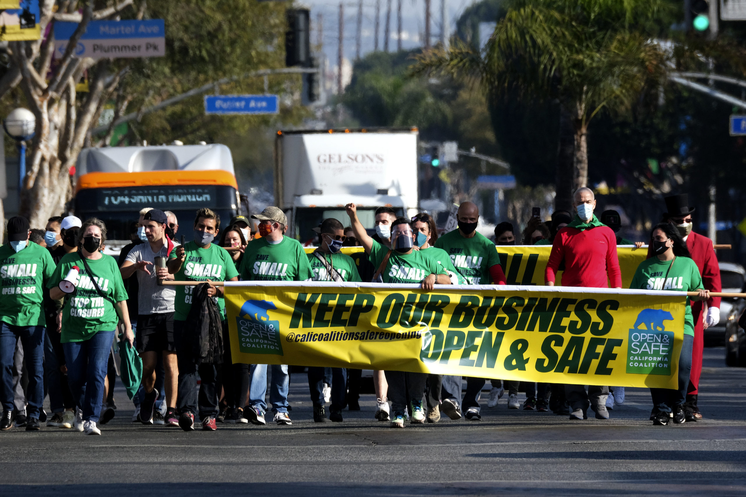 Members of small business owners take part in a 'Save Small Business' protest in Los Angeles, California on Dec. 12. (Ringo Chiu/AFP via Getty Images)