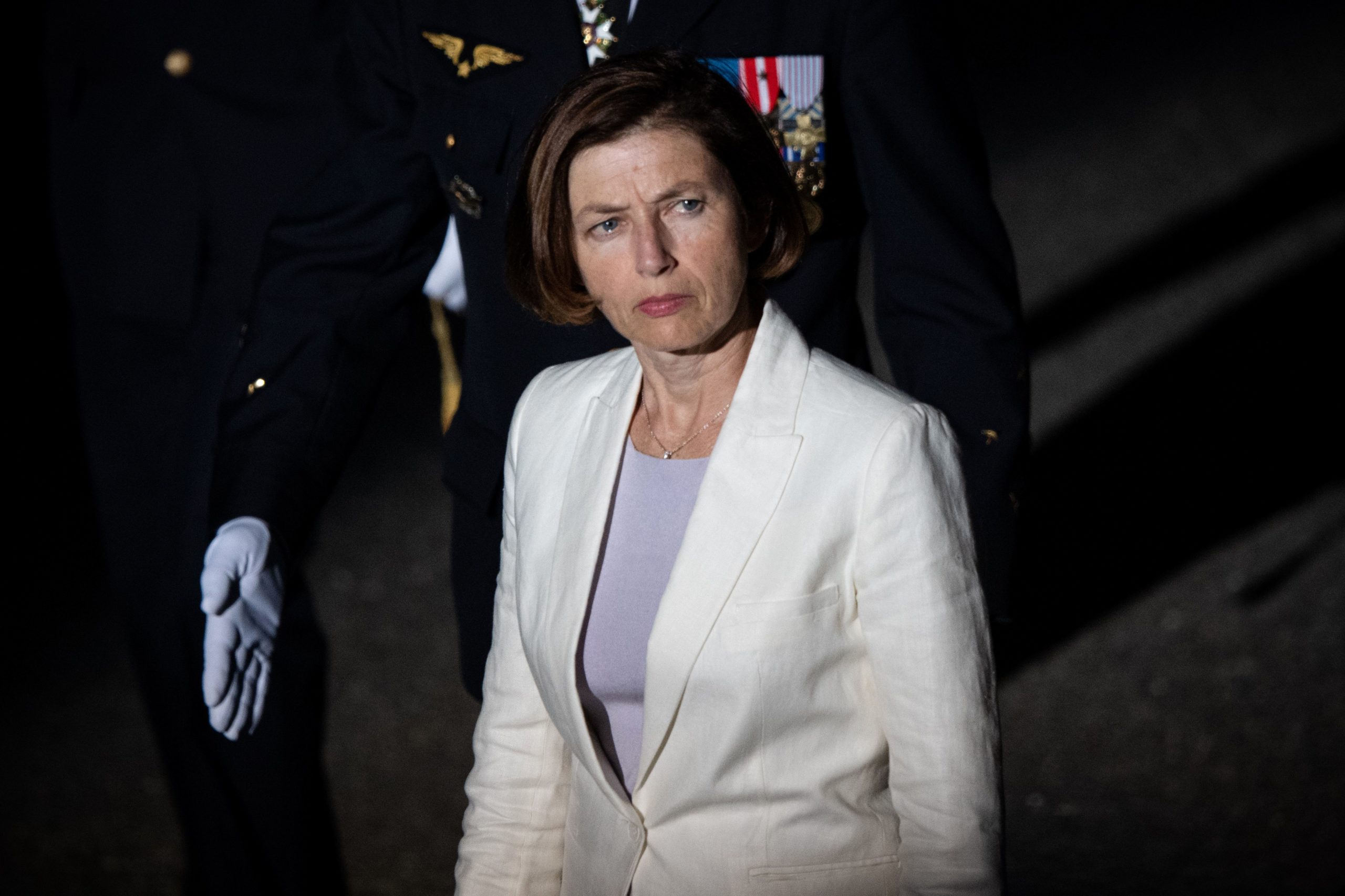 French Defence Minister Florence Parly walks on the Salon-de-Provence air base yard on July 24, 2020 during the baptism ceremony of the 2019 Air School officer cadets. (Photo by CLEMENT MAHOUDEAU/AFP via Getty Images)