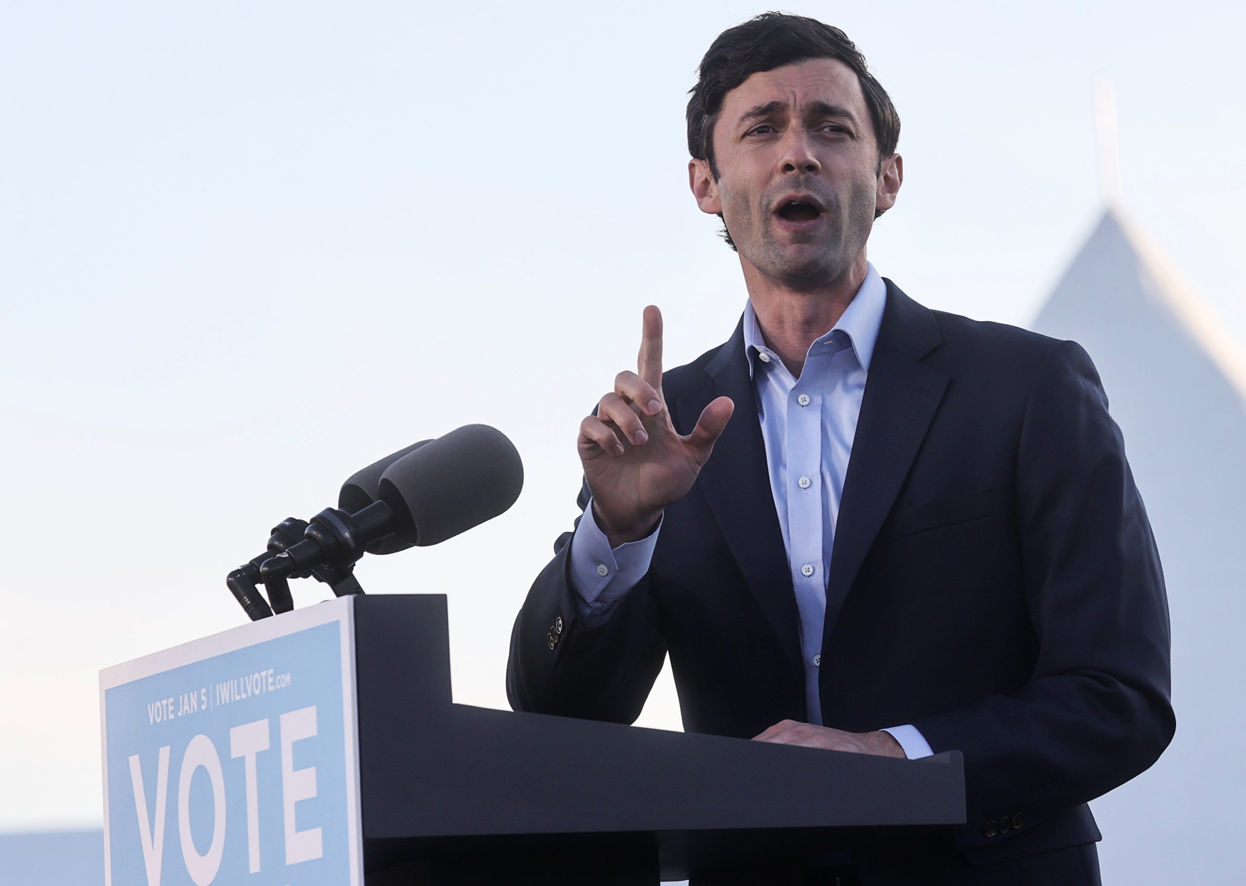 Democratic U.S. Senate candidate from Georgia Jon Ossoff speaks prior to the arrival of U.S. President-elect Joe Biden at a drive-in campaign rally ahead of the January 5 run-off elections, in Atlanta, Georgia, U.S., January 4, 2021. REUTERS/Jonathan Ernst