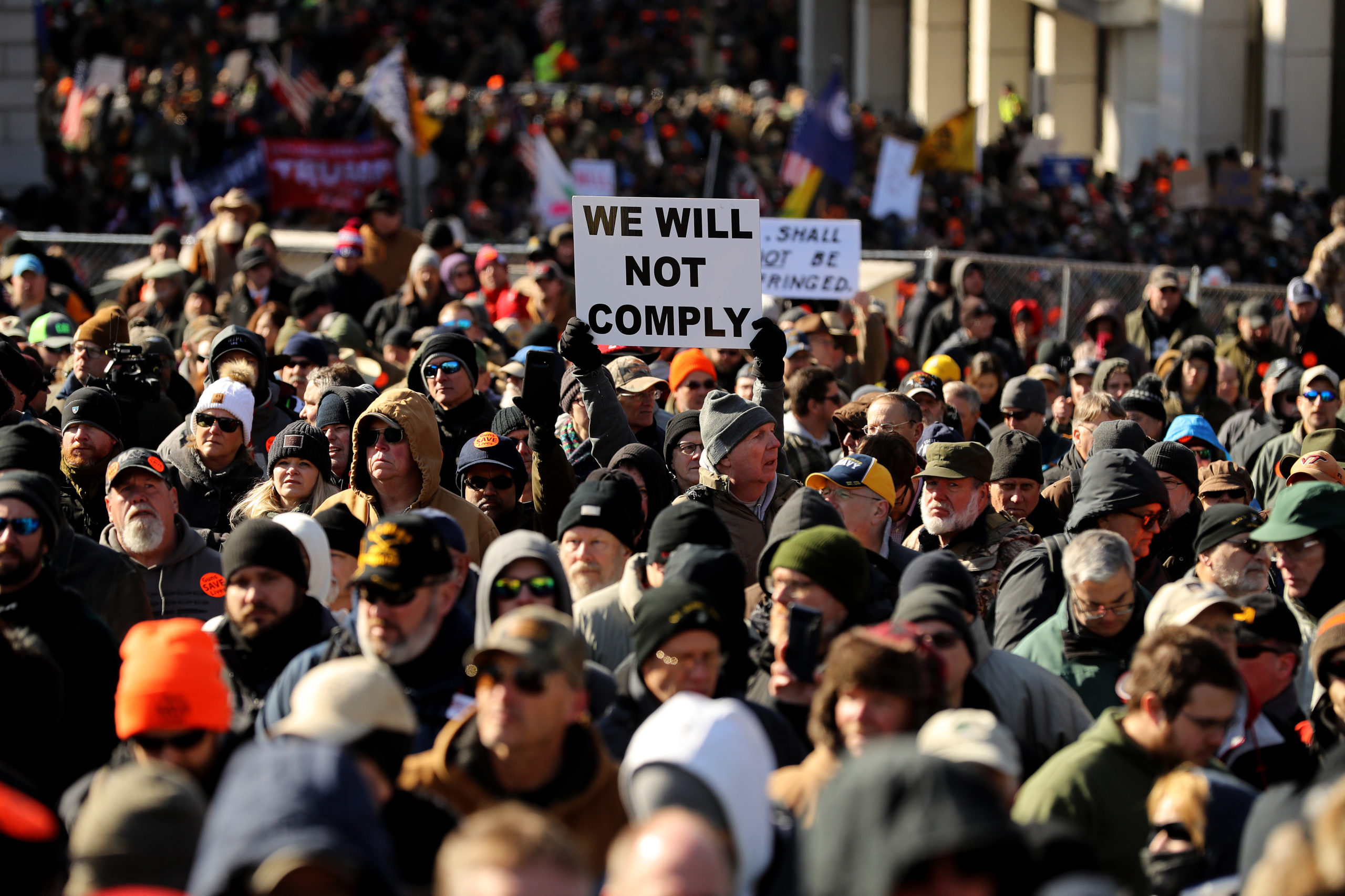 RICHMOND, VIRGINIA - JANUARY 20: Thousands of gun rights advocates attend a rally organized by The Virginia Citizens Defense League on Capitol Square near the state capital building January 20, 2020 in Richmond, Virginia. During elections last year, Virginia Governor Ralph Northam promised to enact sweeping gun control laws in 2020, including limiting handgun purchase to one per month, banning military-style weapons and silencers, allowing localities to ban guns in public spaces and enacting a 'red flag' law so authorities can temporarily seize weapons from someone deemed a threat. While event organizers have asked supporters to show up un-armed, militias and other extremist groups from across the country plan to attend the rally and show their support for gun rights. (Chip Somodevilla/Getty Images)