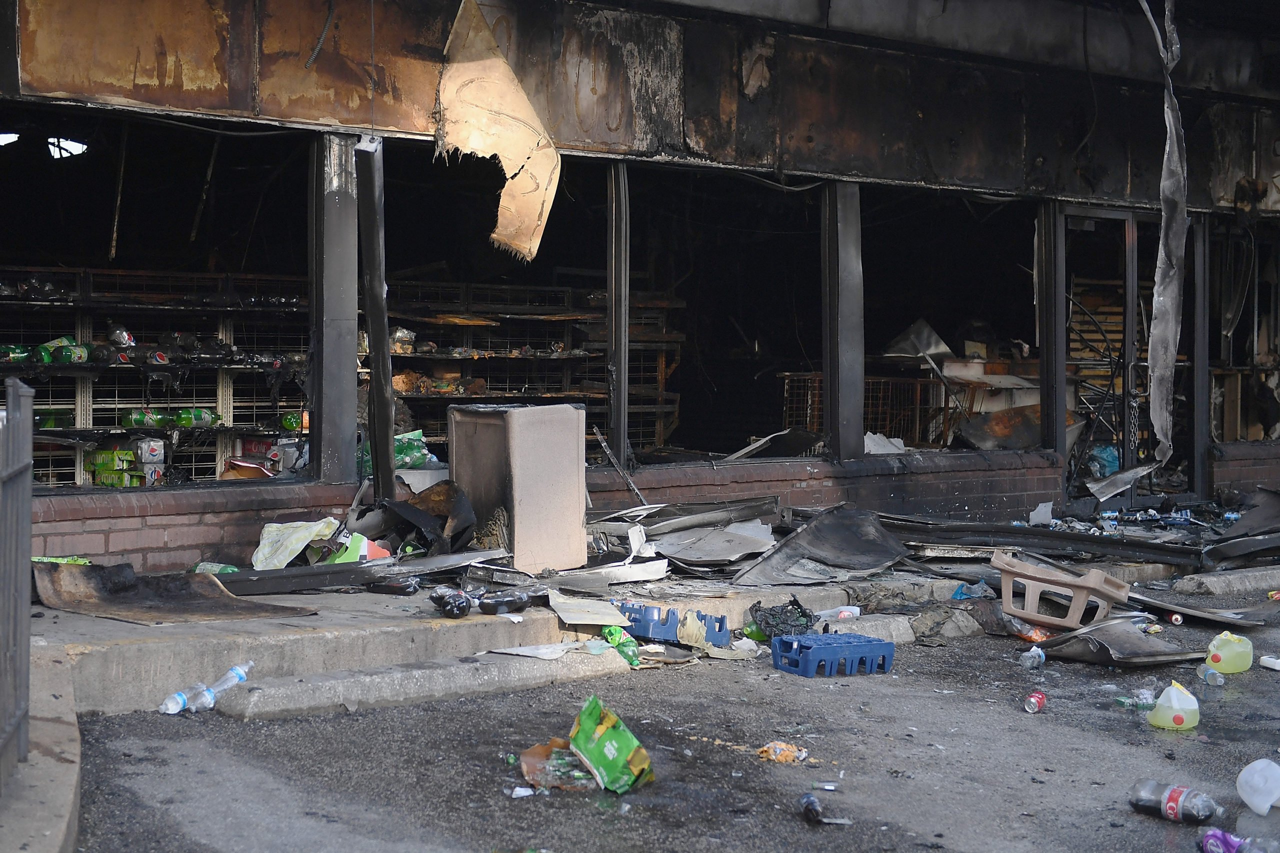ST LOUIS, MO - JUNE 2: A 7Eleven is seen damaged after being set on fire during riots and looting overnight on June 2, 2020 in St Louis, Missouri. Four police officers were reportedly shot in St. Louis overnight during violent clashes with protesters leading to looting and damage to local businesses. (Photo by Michael B. Thomas/Getty Images)